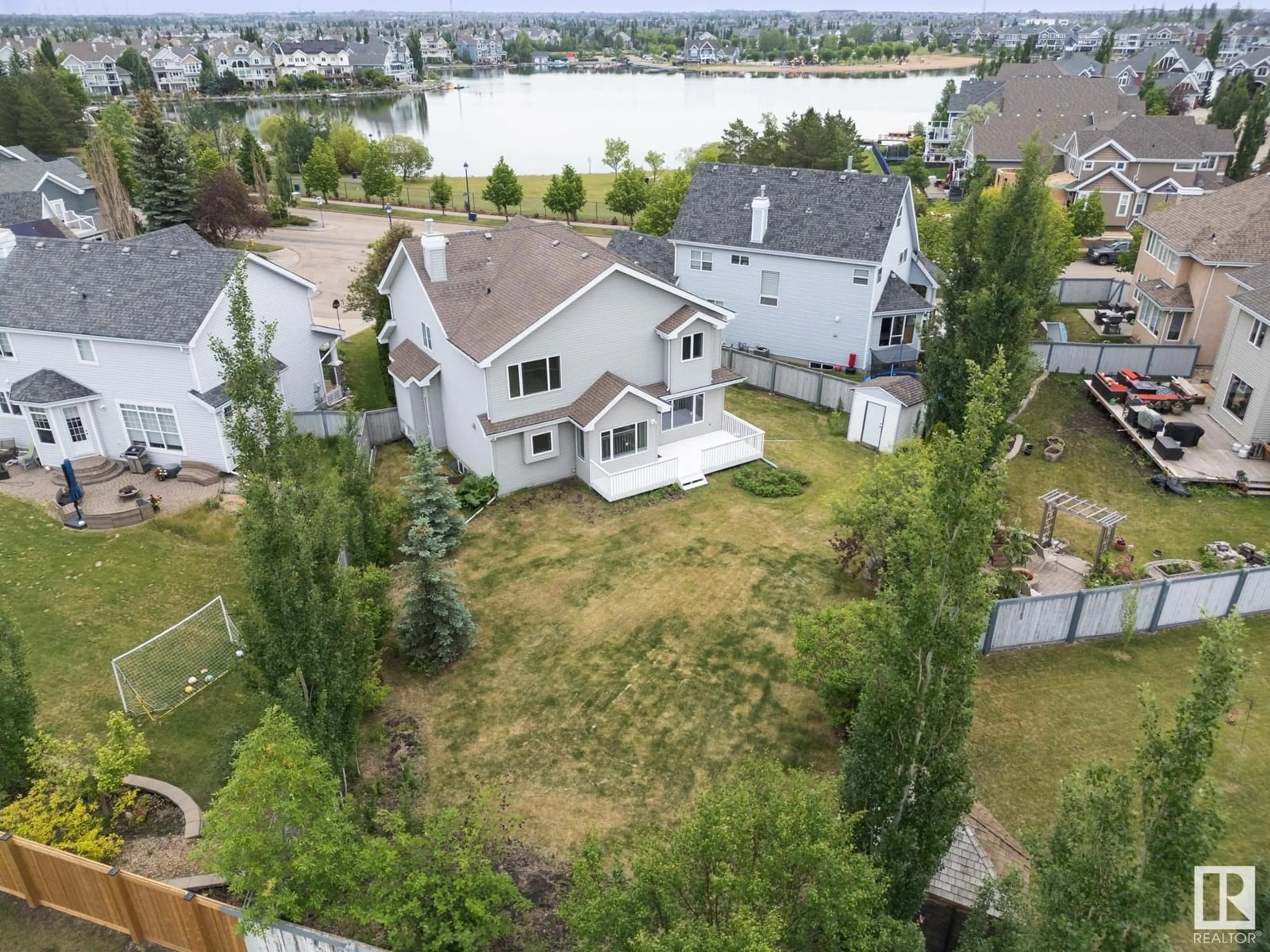 A pic from outside/outdoor area/front of a property/back of a property/a pic from drone, water/lake/river/ocean view for LI SW - 912 SUMMERSIDE LINK, Edmonton Alberta T6X1B2