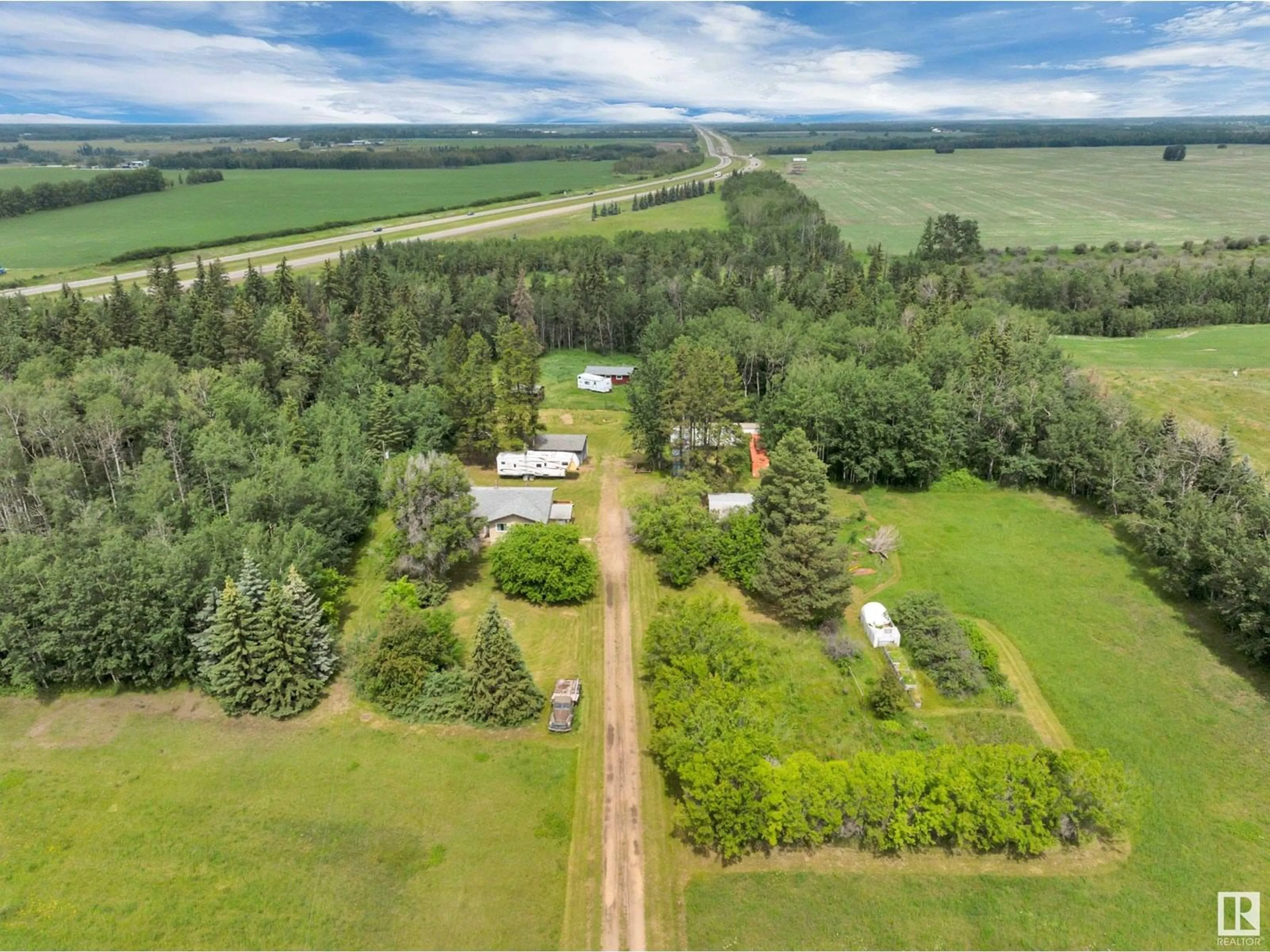 A pic from outside/outdoor area/front of a property/back of a property/a pic from drone, forest/trees view for 253046 TWP ROAD 472, Rural Wetaskiwin County Alberta T0C1Z0