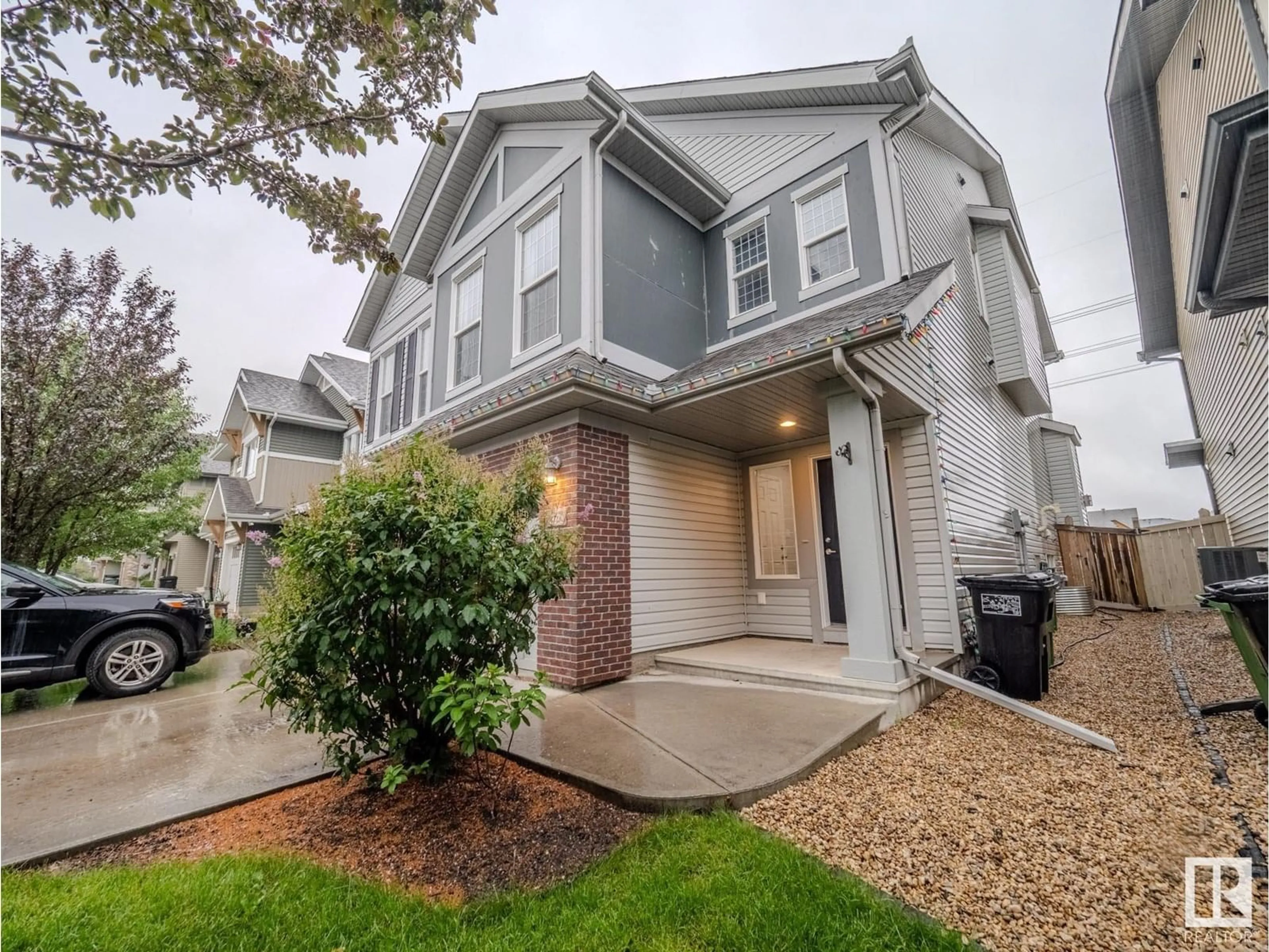 Home with vinyl exterior material, street for 1674 CHAPMAN WY, Edmonton Alberta T6W0Y5