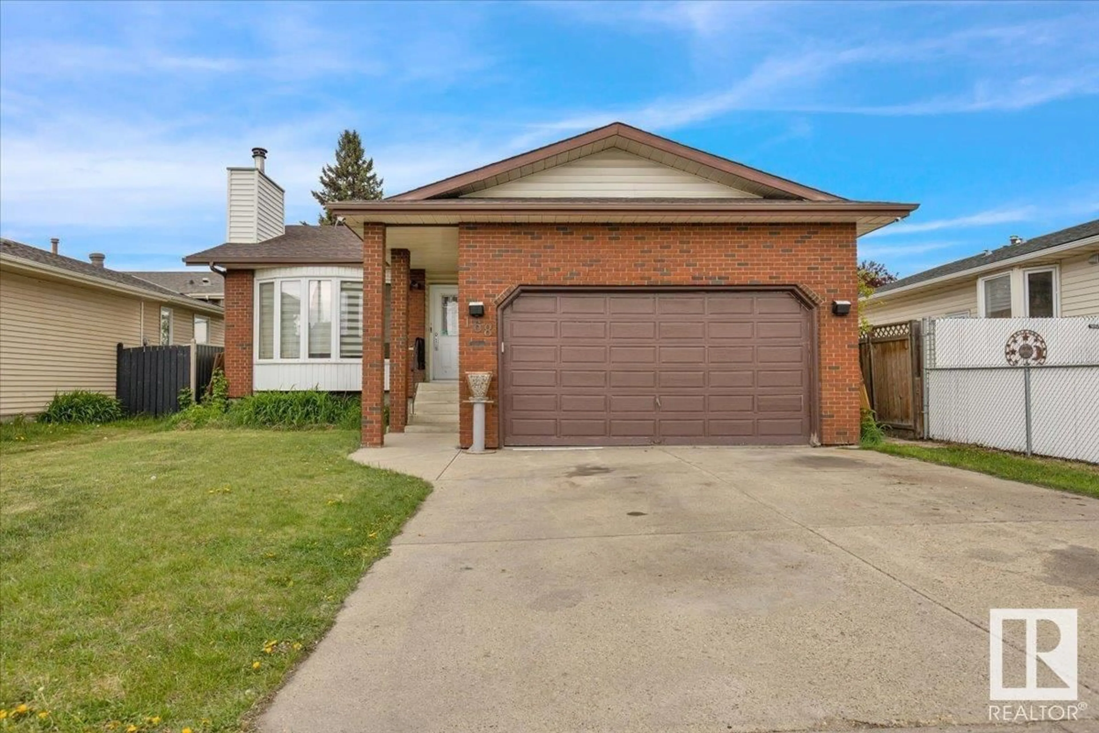 Home with brick exterior material, street for 168 WARWICK CR, Edmonton Alberta T5X5P6