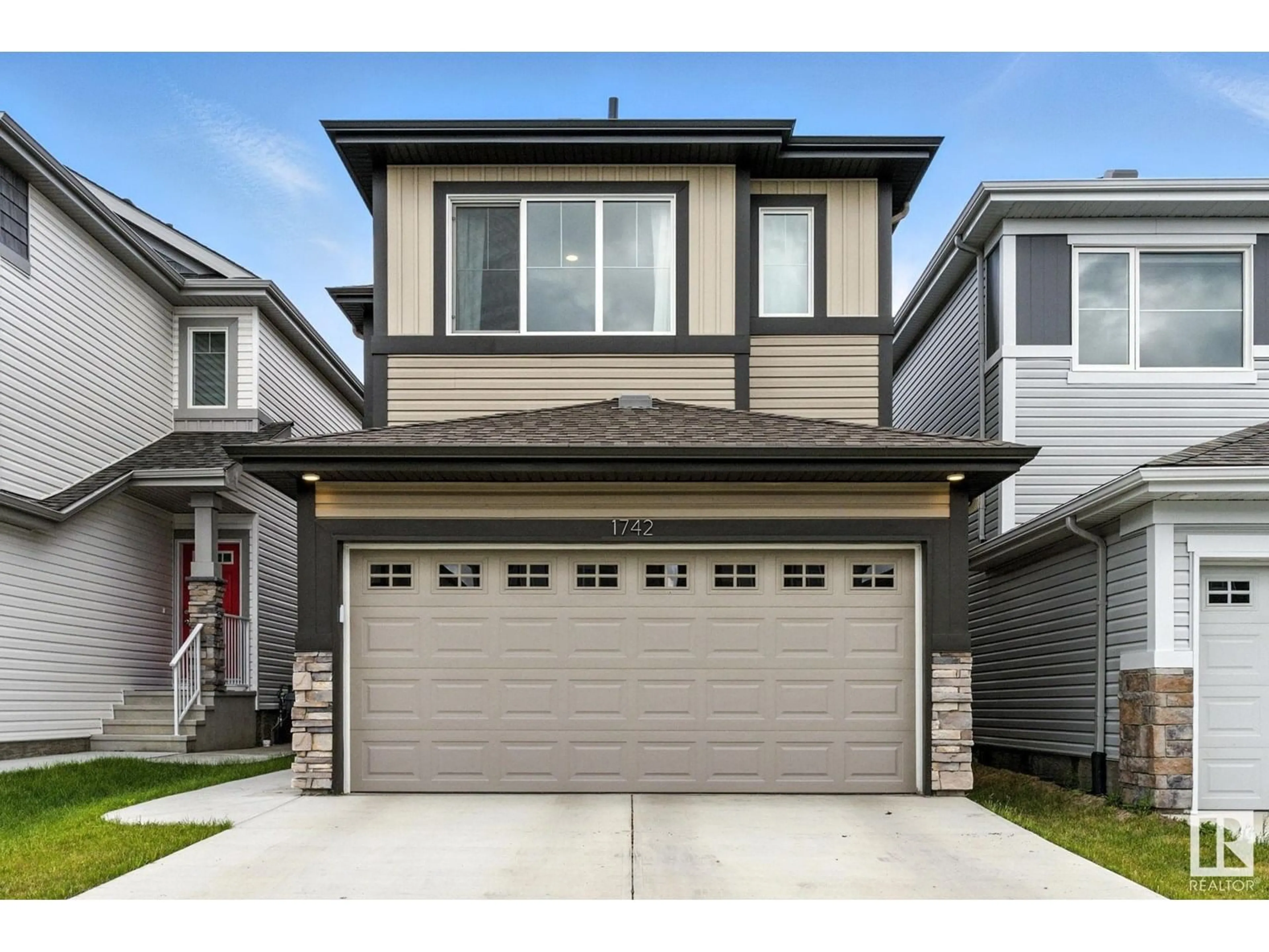 Home with vinyl exterior material, street for NW - 1742 ERKER WY, Edmonton Alberta T6M1J2