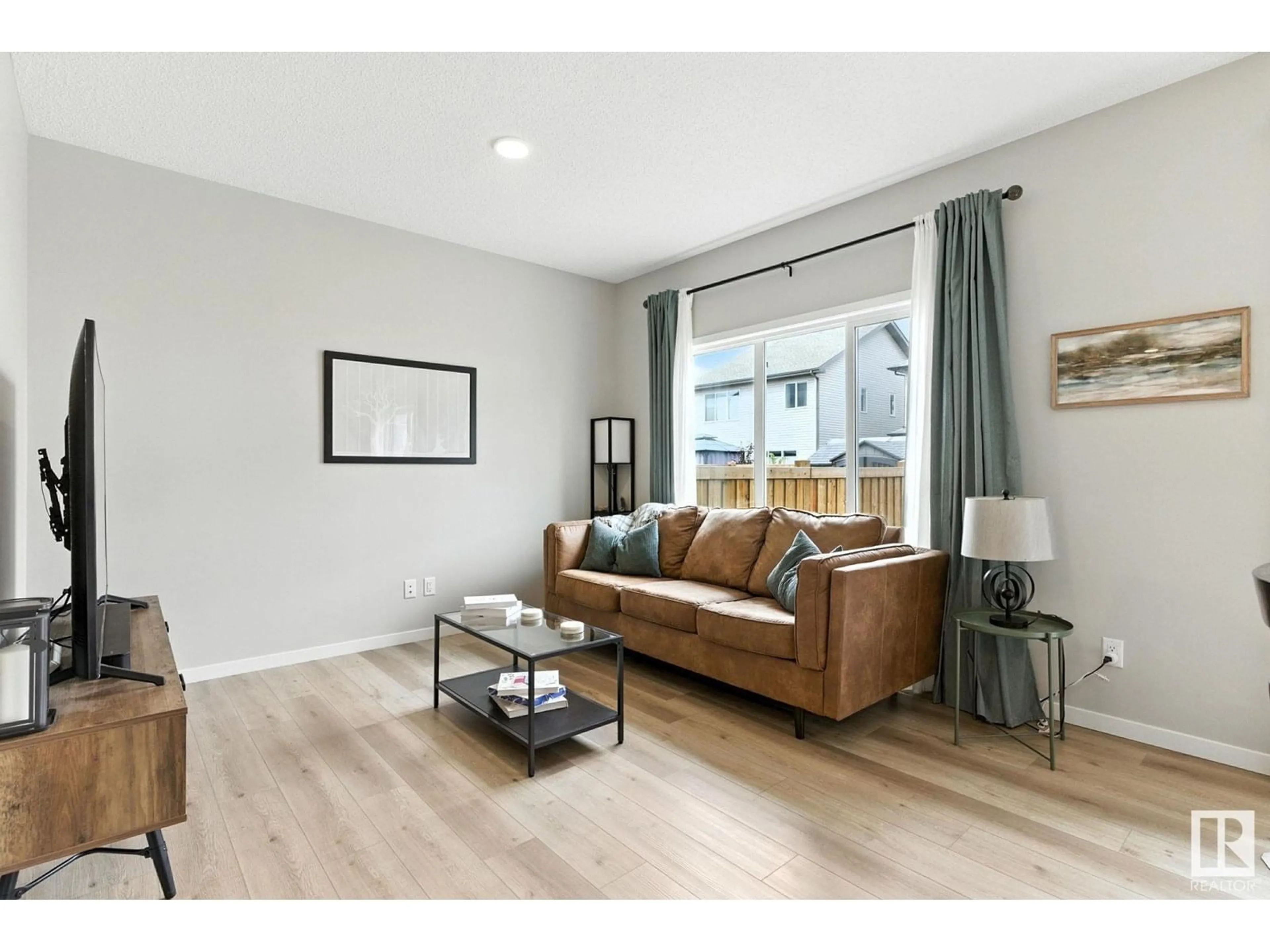 Living room with furniture, wood/laminate floor for NW - 1742 ERKER WY, Edmonton Alberta T6M1J2