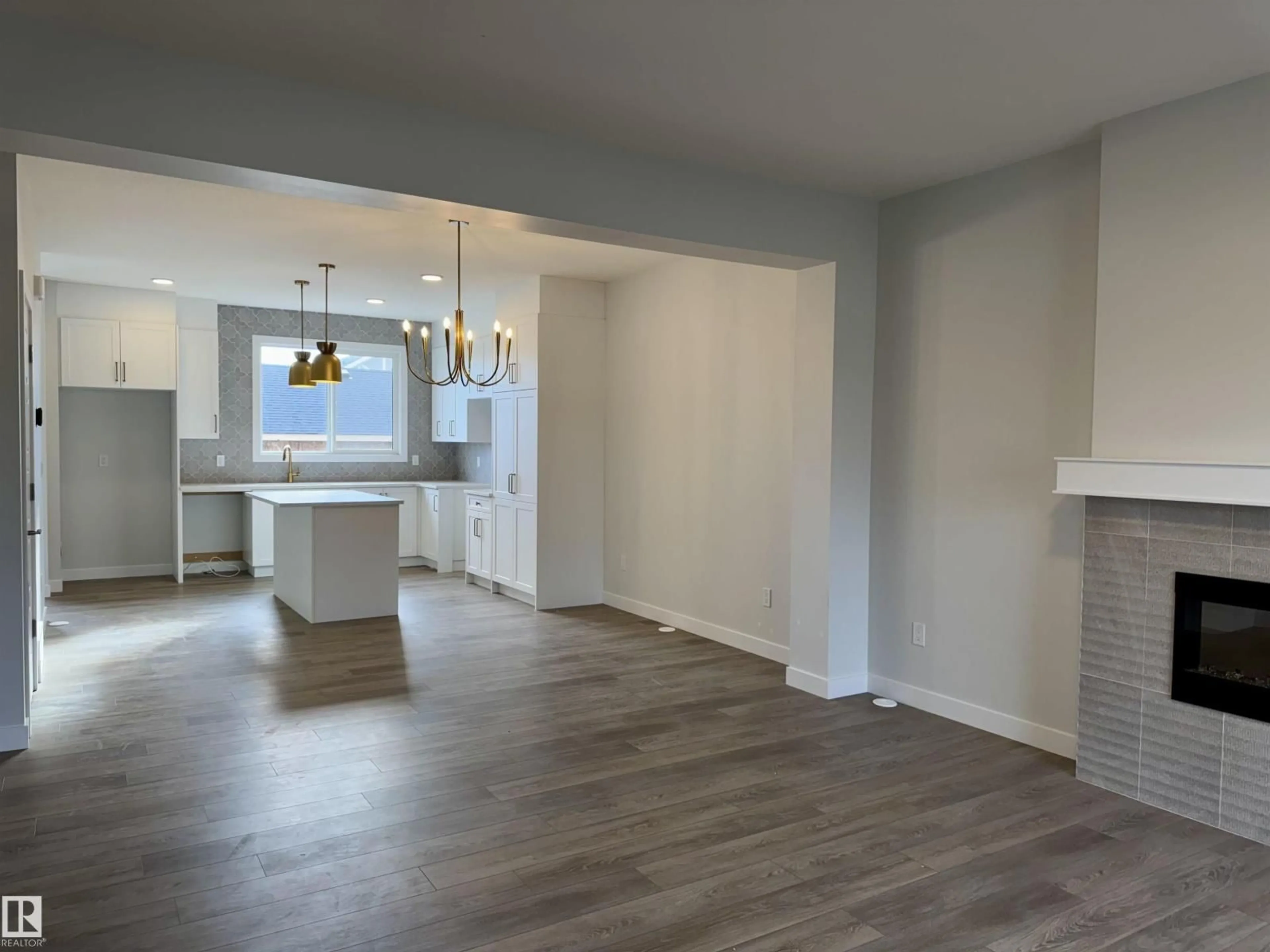 Open concept kitchen, unknown for 3317 ROY BROWN WY, Edmonton Alberta T5E6Z9