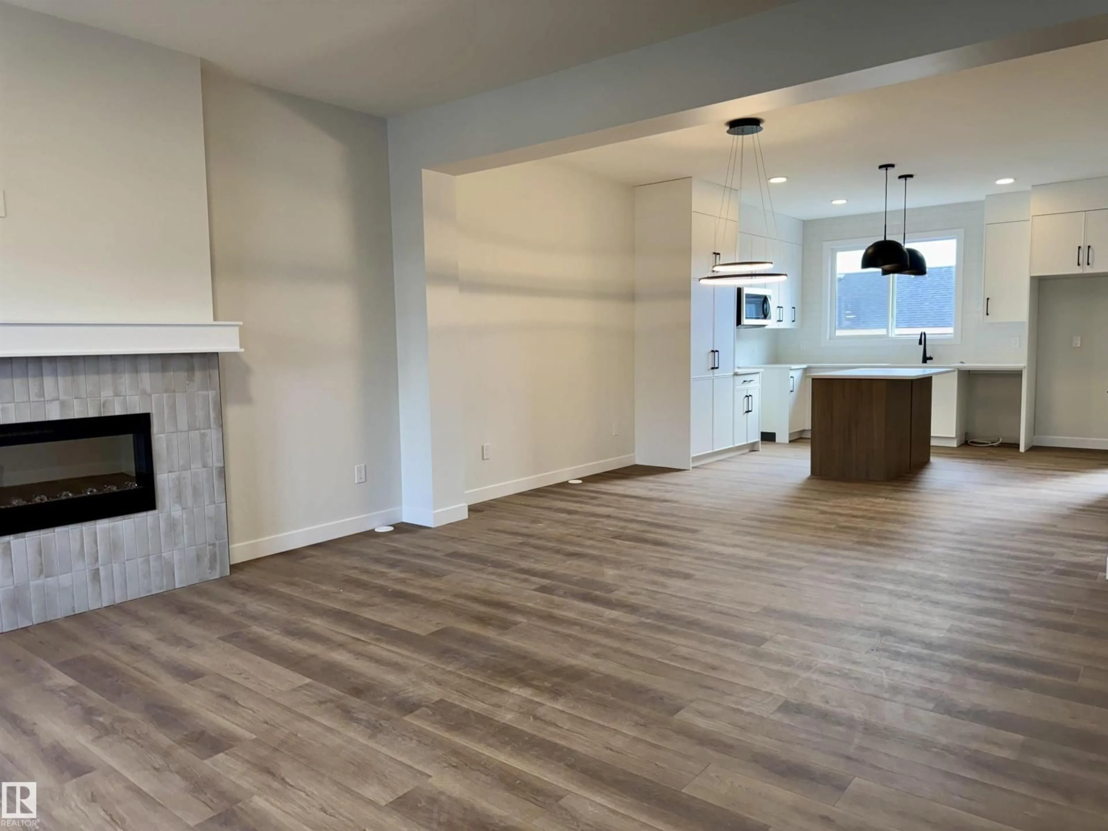 Open concept kitchen, unknown for 3319 ROY BROWN WY, Edmonton Alberta T5E6Z9