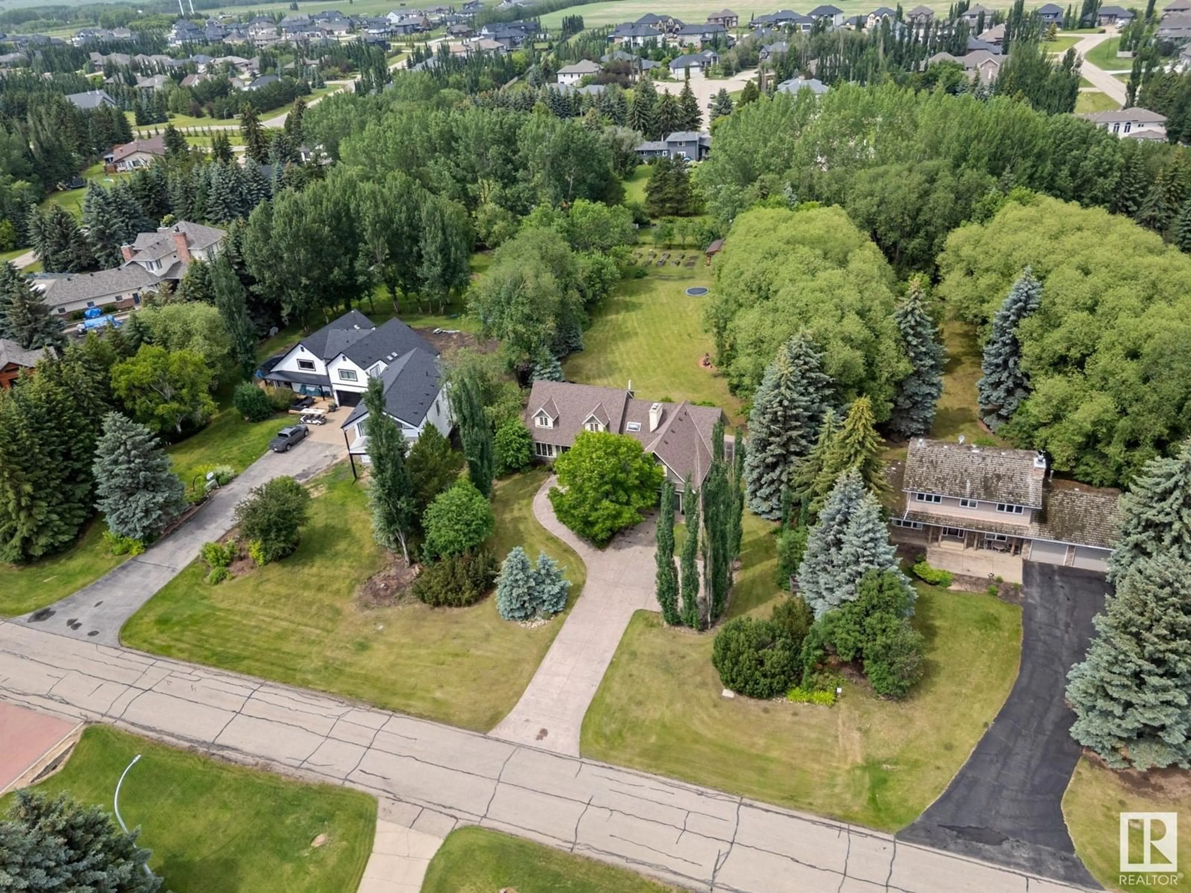 A pic from outside/outdoor area/front of a property/back of a property/a pic from drone, unknown for 24 54418 RGE ROAD 251, Rural Sturgeon County Alberta T8T0C7