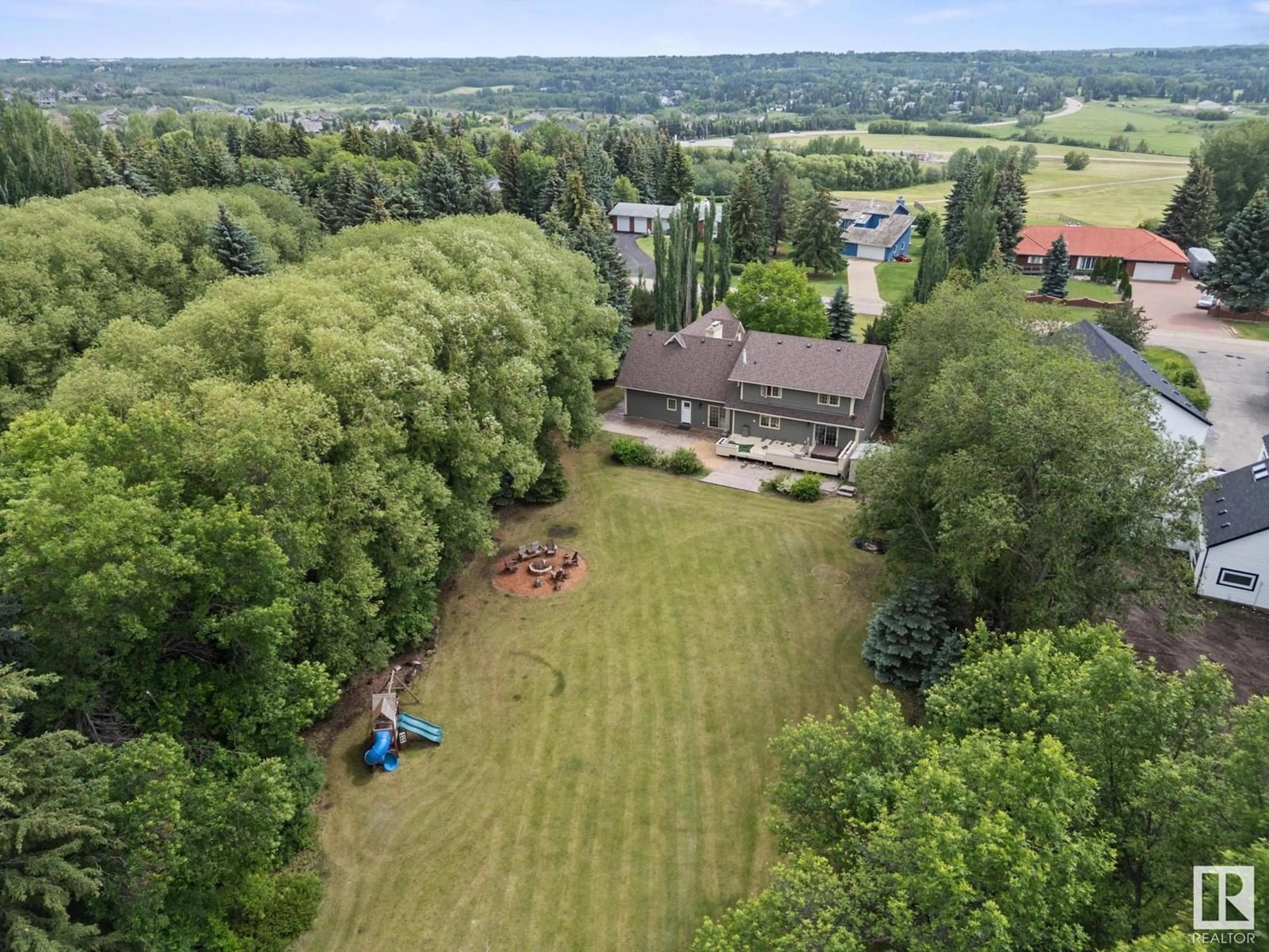 A pic from outside/outdoor area/front of a property/back of a property/a pic from drone, forest/trees view for 24 54418 RGE ROAD 251, Rural Sturgeon County Alberta T8T0C7