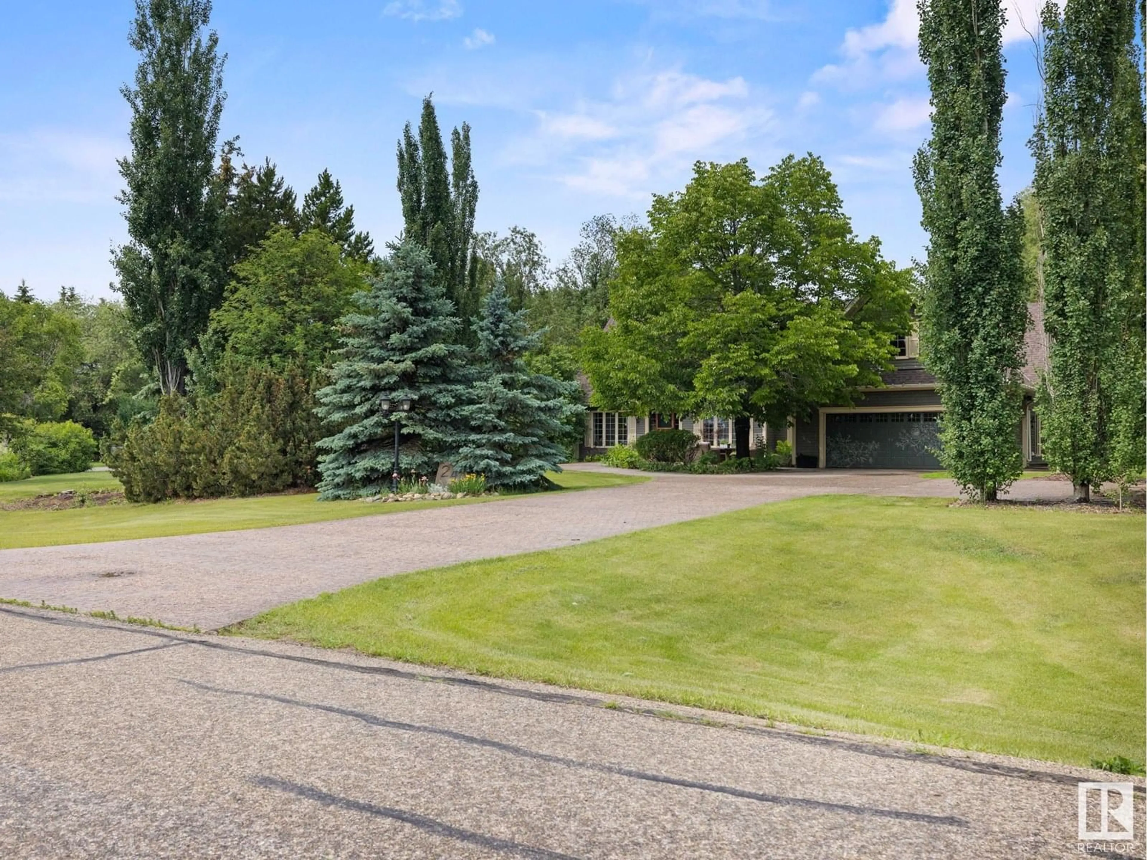 A pic from outside/outdoor area/front of a property/back of a property/a pic from drone, street for 24 54418 RGE ROAD 251, Rural Sturgeon County Alberta T8T0C7