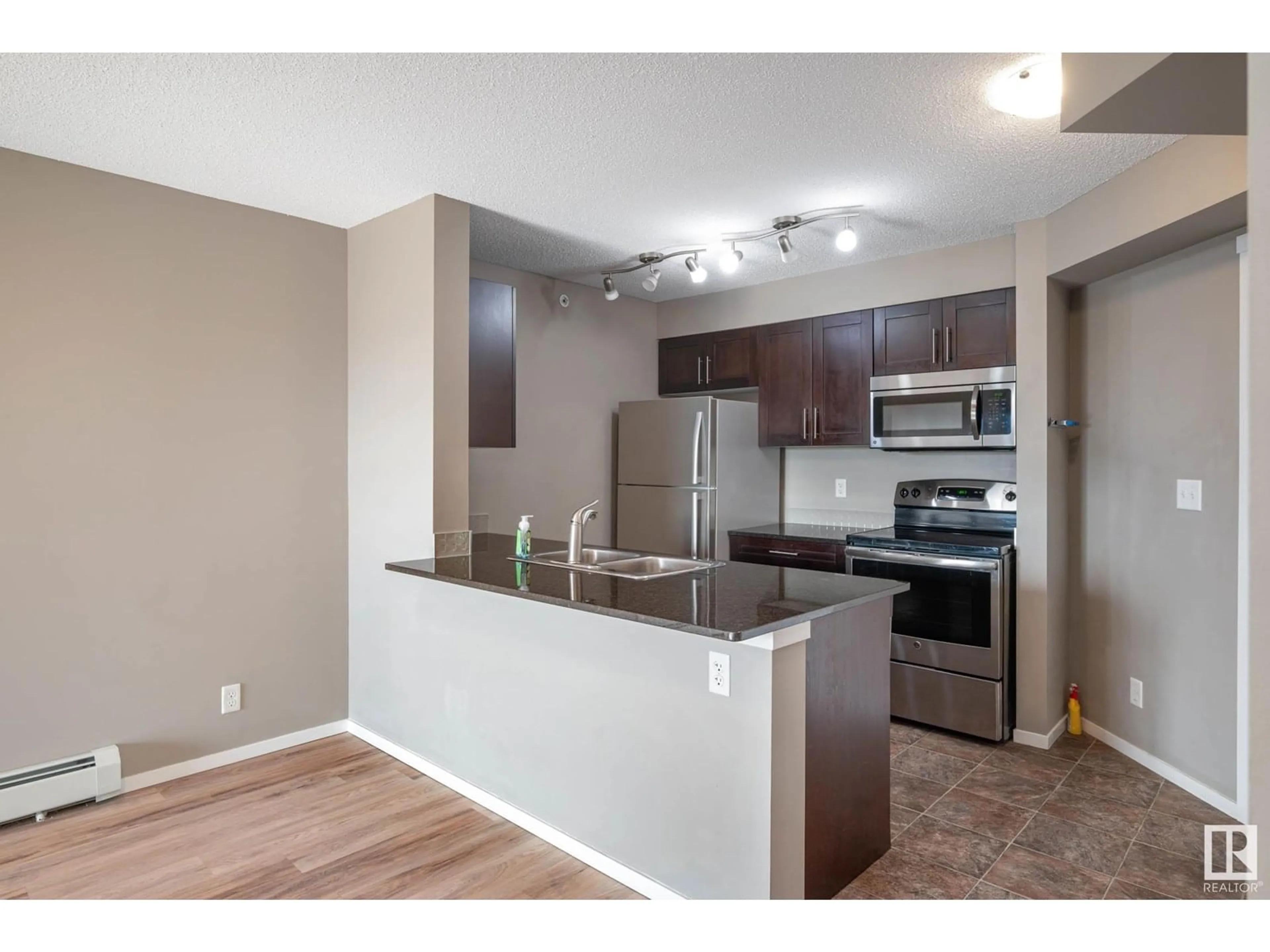 Standard kitchen, wood/laminate floor for #416 - 5370 CHAPPELLE RD, Edmonton Alberta T6W3L5