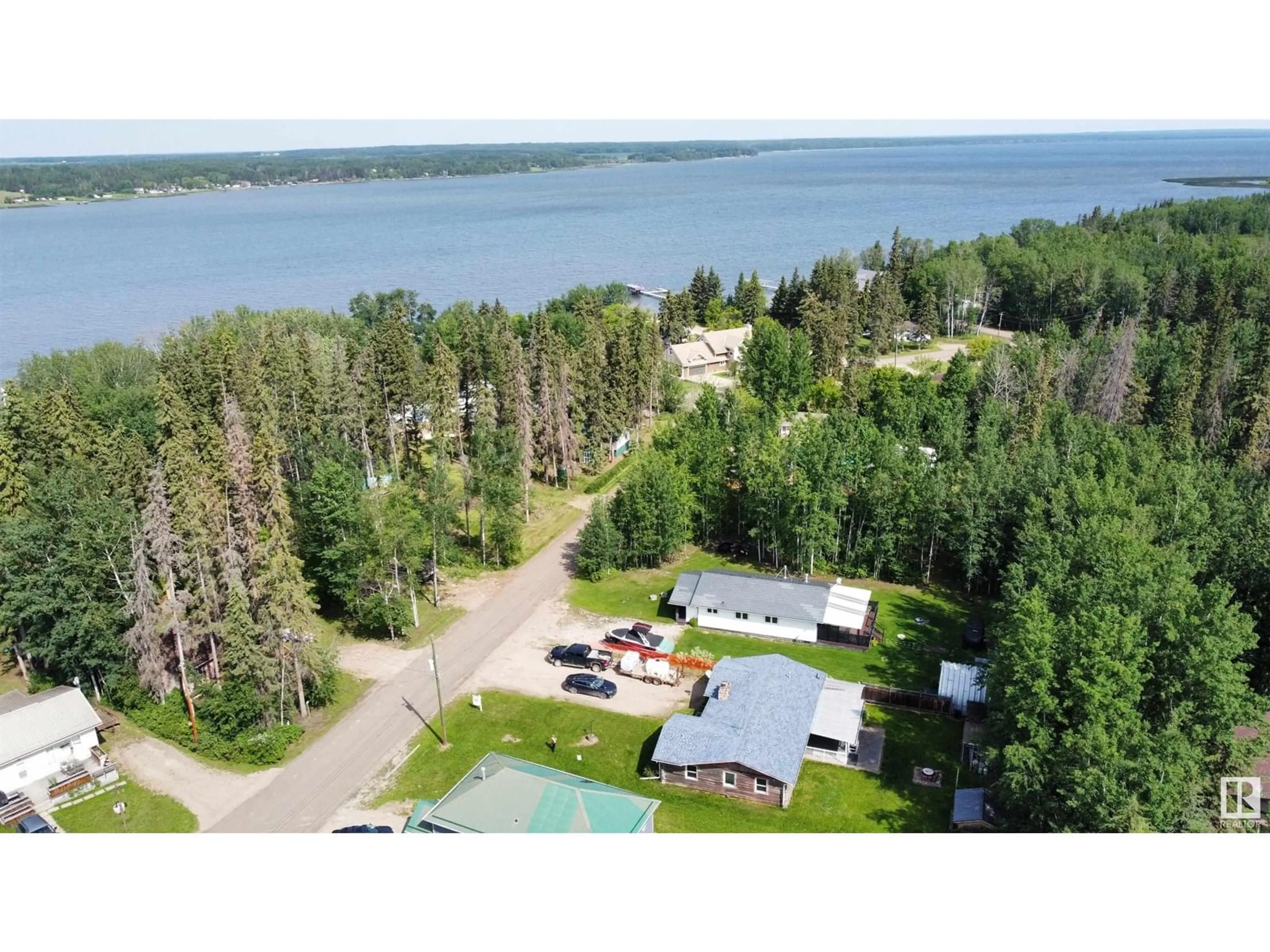 A pic from outside/outdoor area/front of a property/back of a property/a pic from drone, water/lake/river/ocean view for 15538 - 129 OLD TRAIL ROAD, Rural Lac La Biche County Alberta T0A2T0