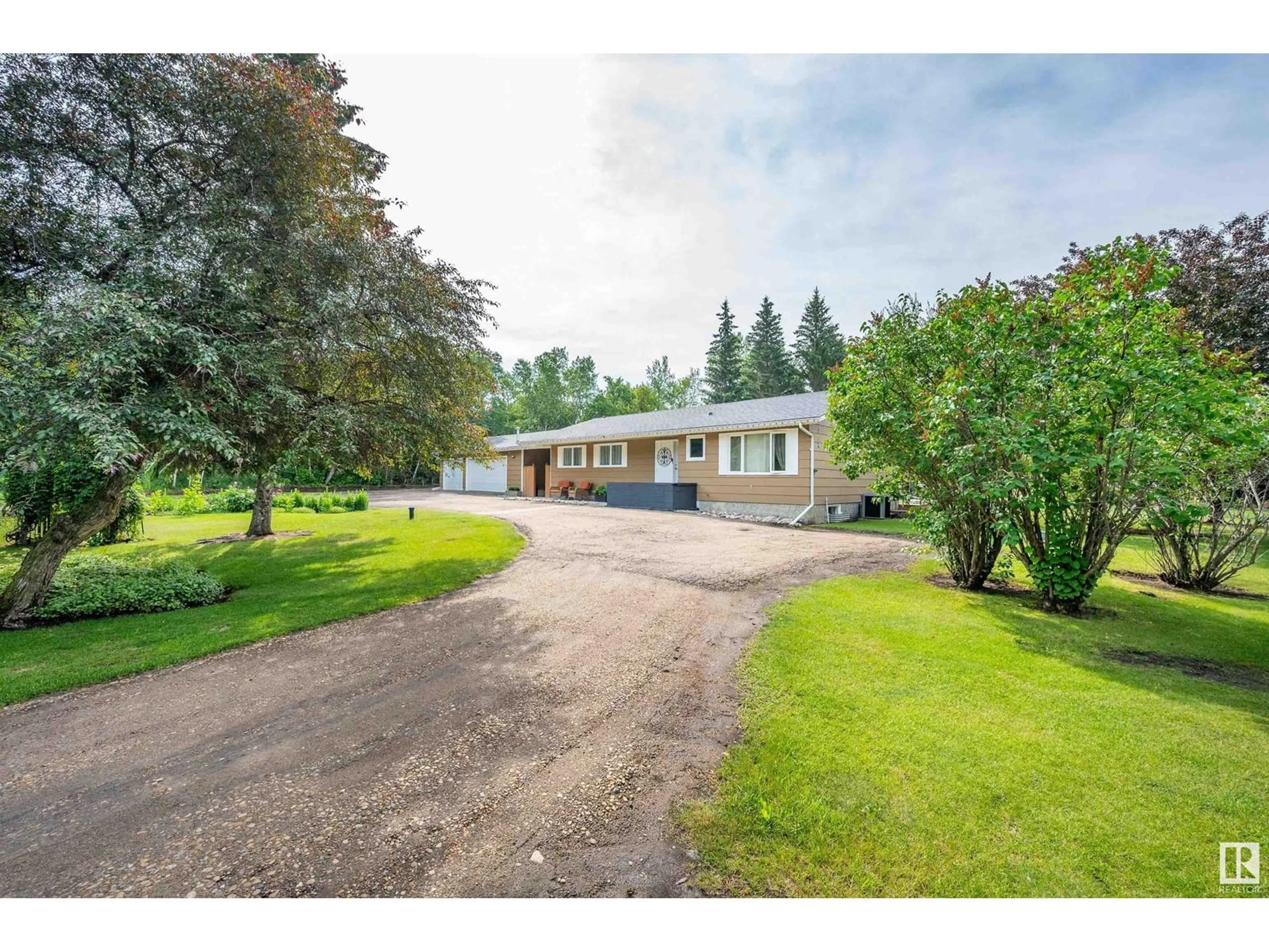 A pic from outside/outdoor area/front of a property/back of a property/a pic from drone, street for 37 - 53059 RGE ROAD 224, Rural Strathcona County Alberta T8E2K4