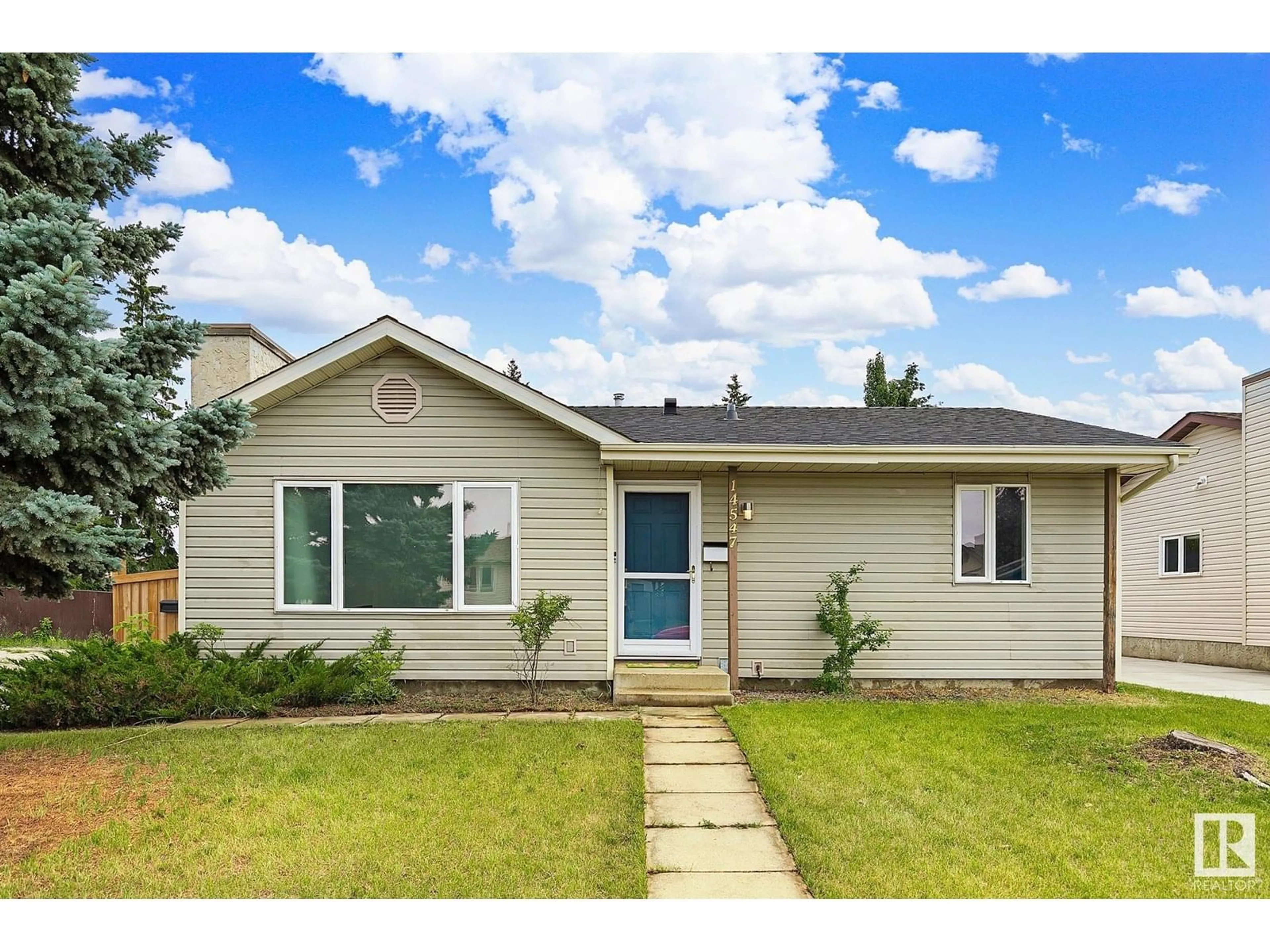 Home with vinyl exterior material, street for 14547 21 ST, Edmonton Alberta T5Y1T7