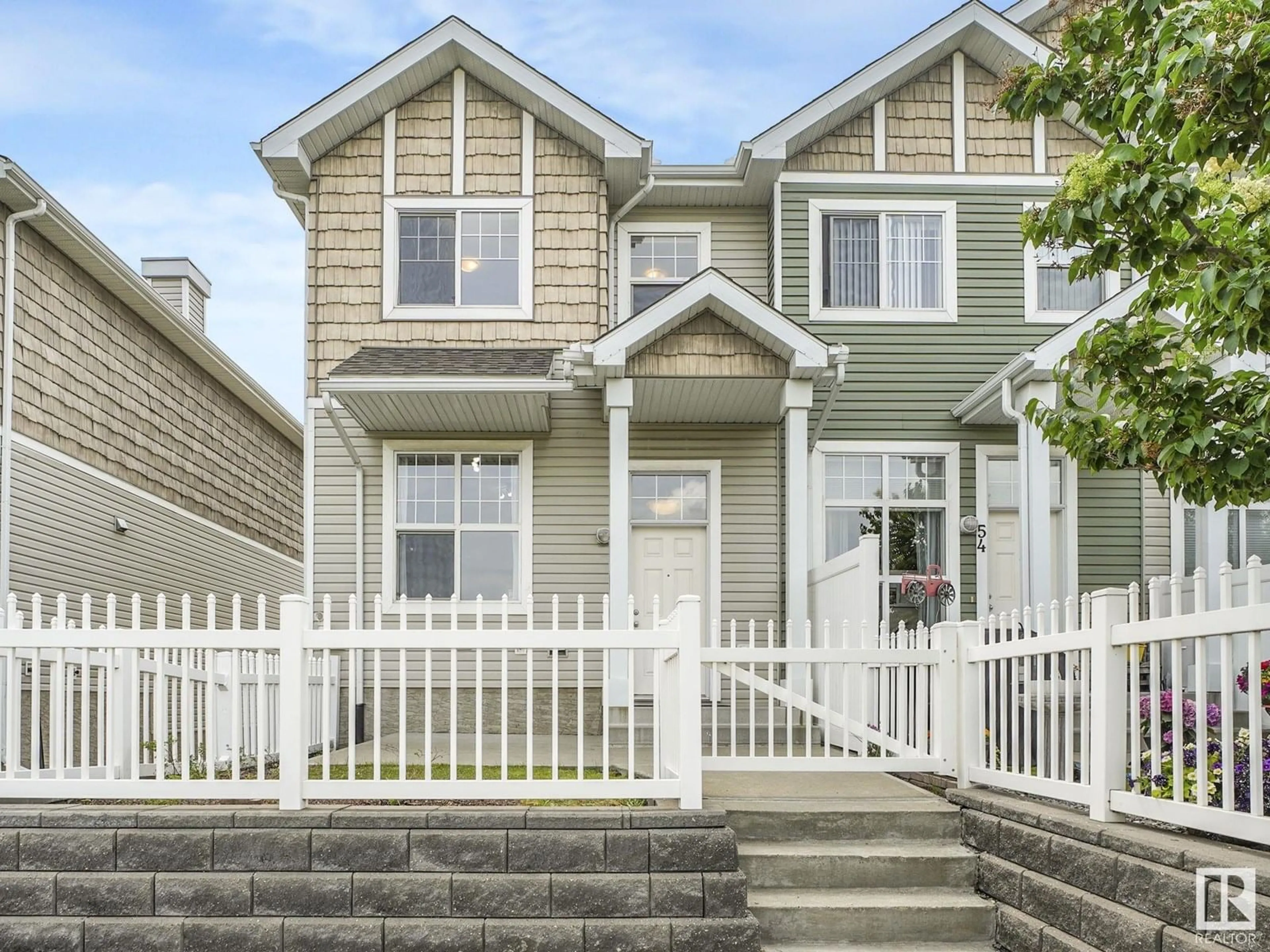Home with vinyl exterior material, street for #53 - 2051 TOWNE CENTRE BV, Edmonton Alberta T6R0G8