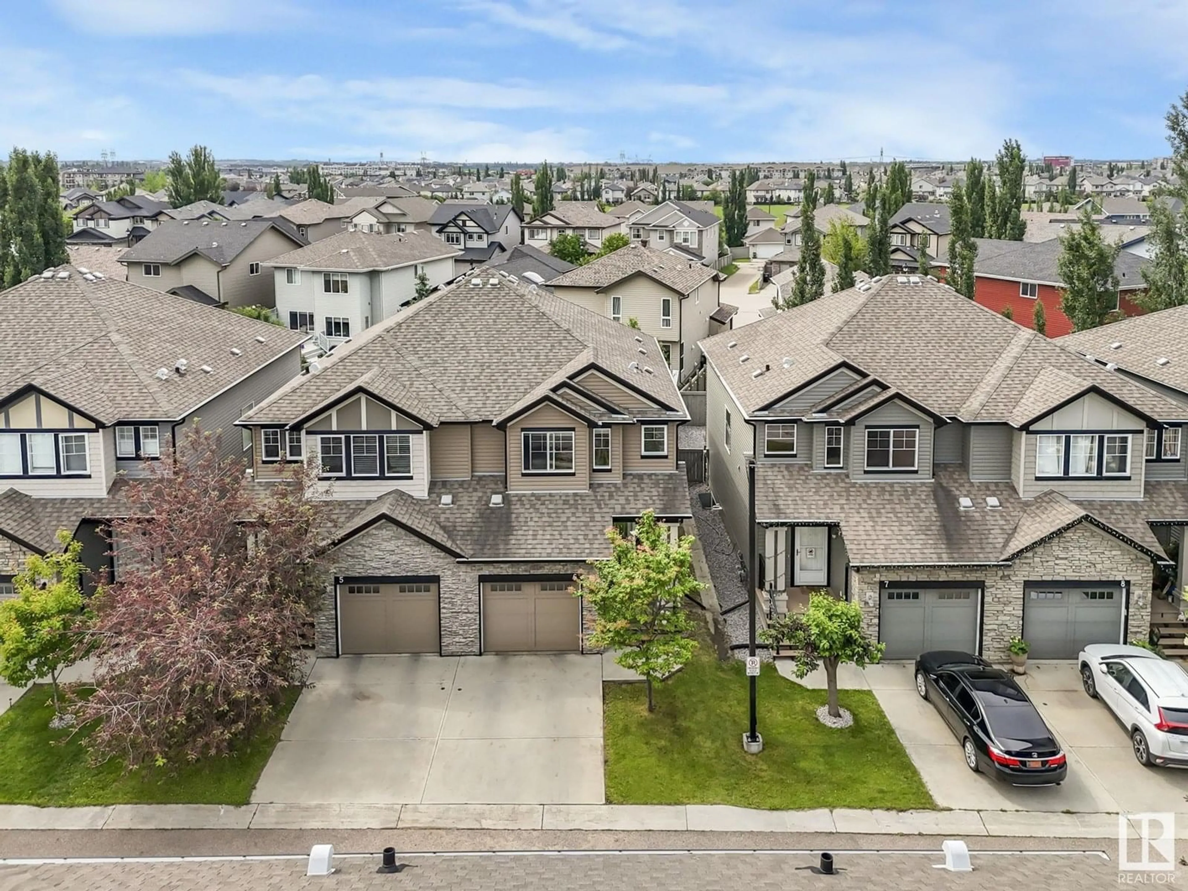 A pic from outside/outdoor area/front of a property/back of a property/a pic from drone, street for #6 - 6835 SPEAKER VISTA VS, Edmonton Alberta T6R0S6