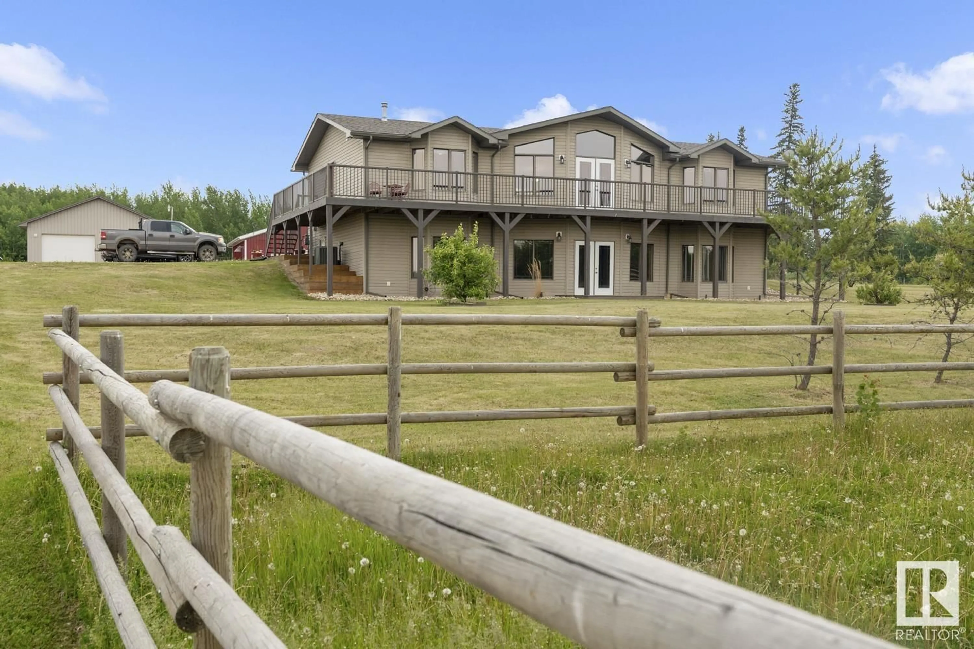 A pic from outside/outdoor area/front of a property/back of a property/a pic from drone, mountain view for 45220 TOWNSHIP ROAD 631, Rural Bonnyville M.D. Alberta T9M1P3