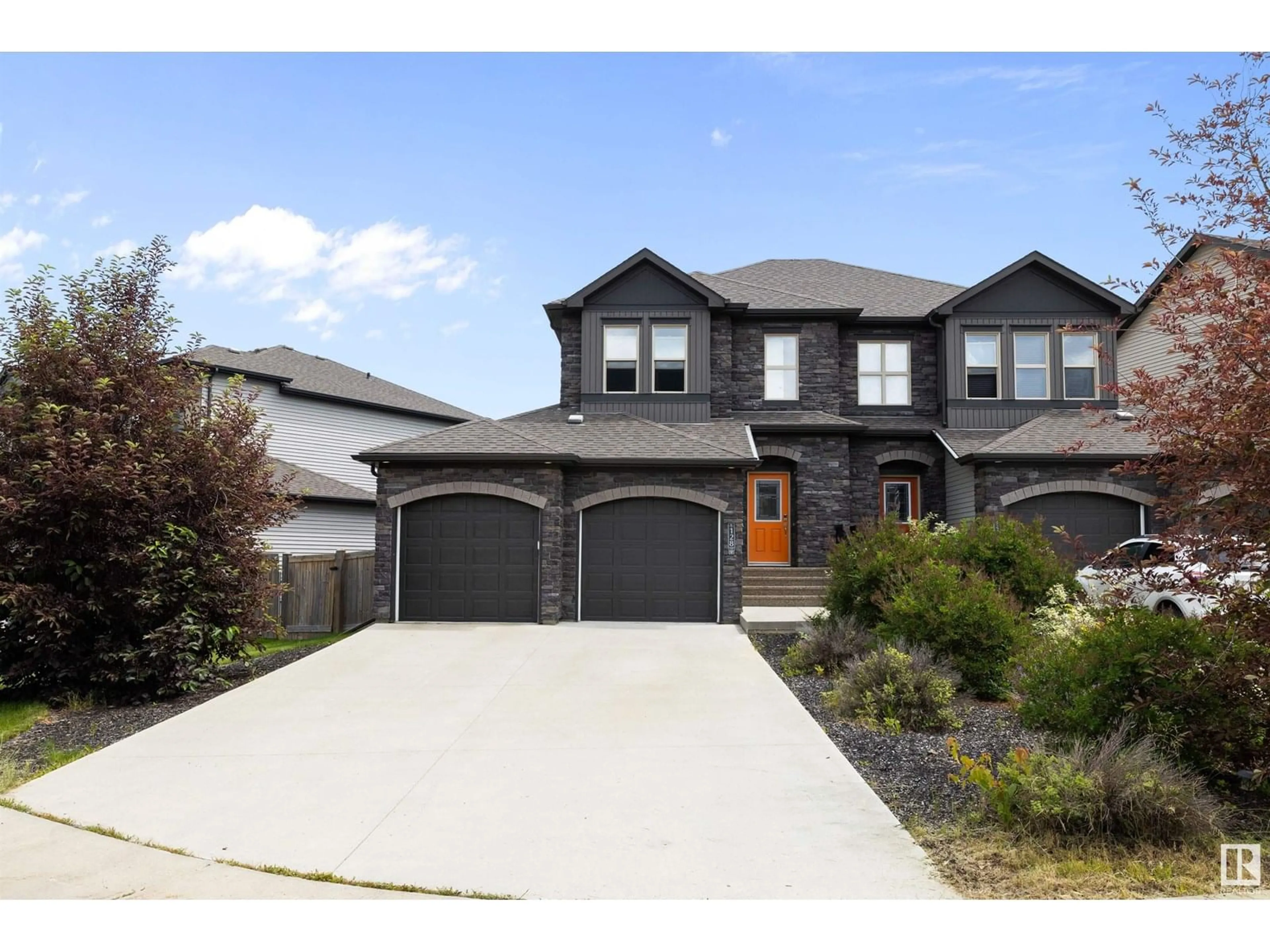 Home with vinyl exterior material, street for 128 GILMORE WY, Spruce Grove Alberta T7X0M5
