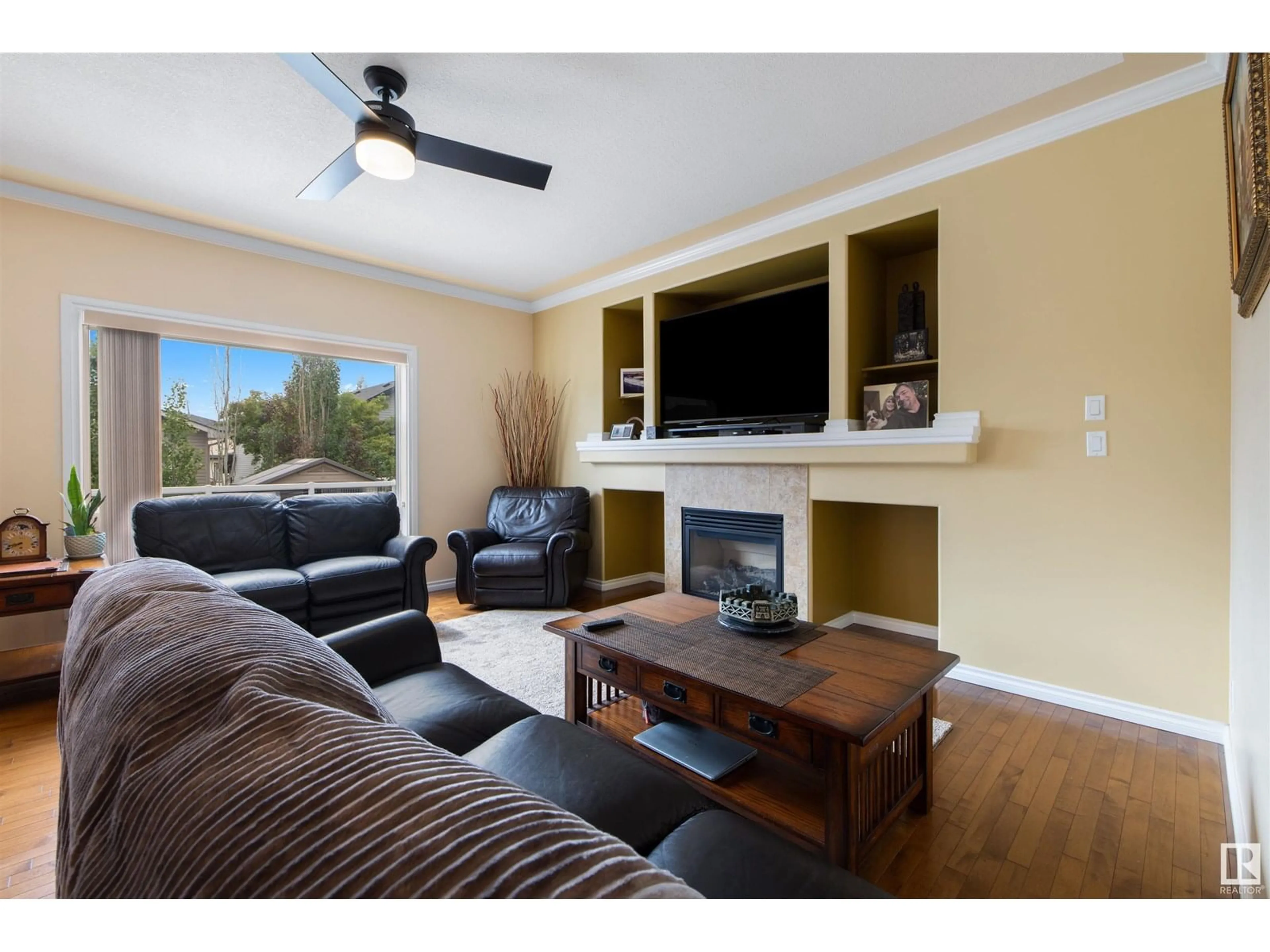 Living room with furniture, wood/laminate floor for NW - 16009 49 ST, Edmonton Alberta T5Y0G7