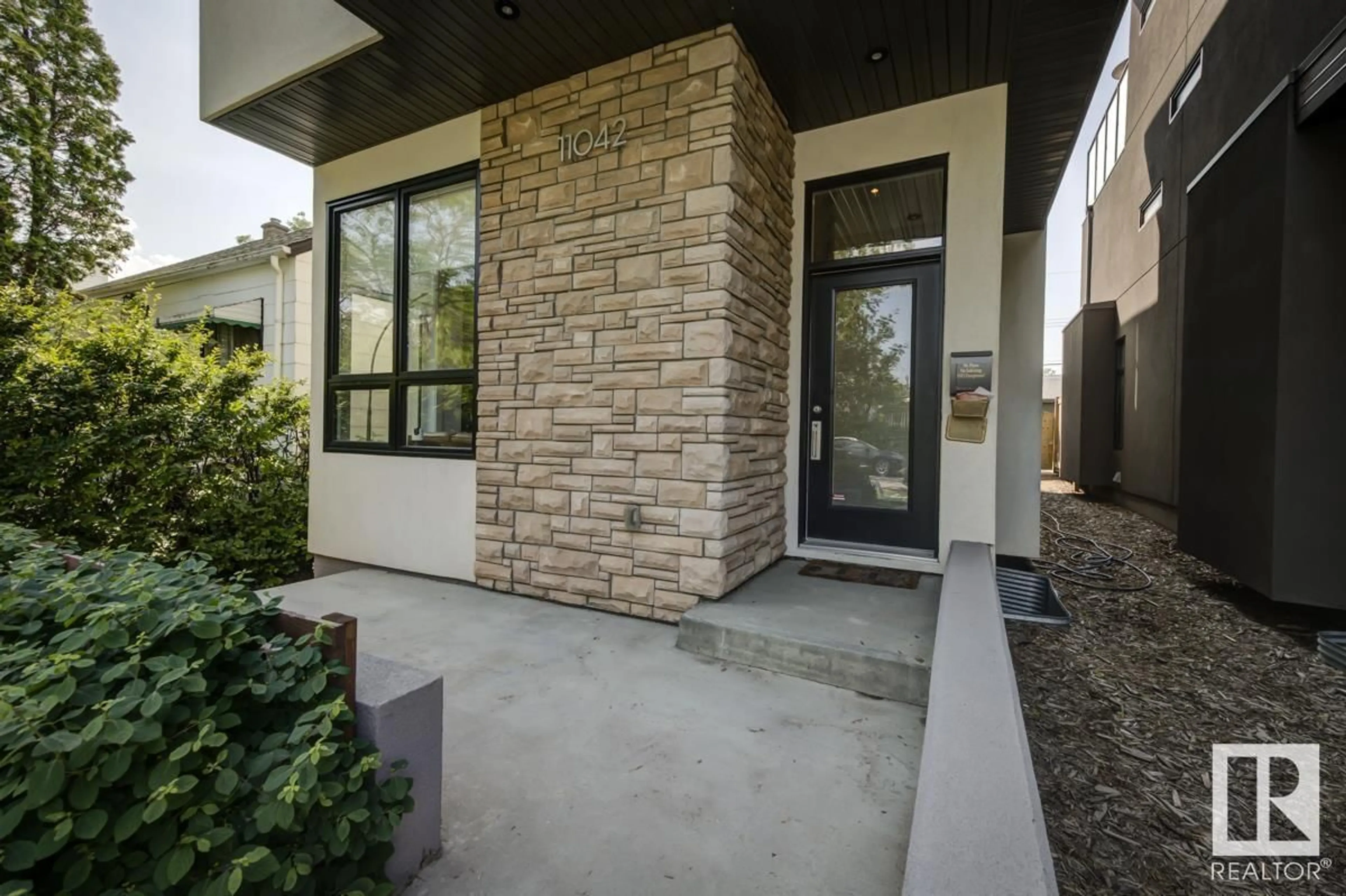 Home with brick exterior material, street for NW - 11042 131 ST, Edmonton Alberta T5M1B8
