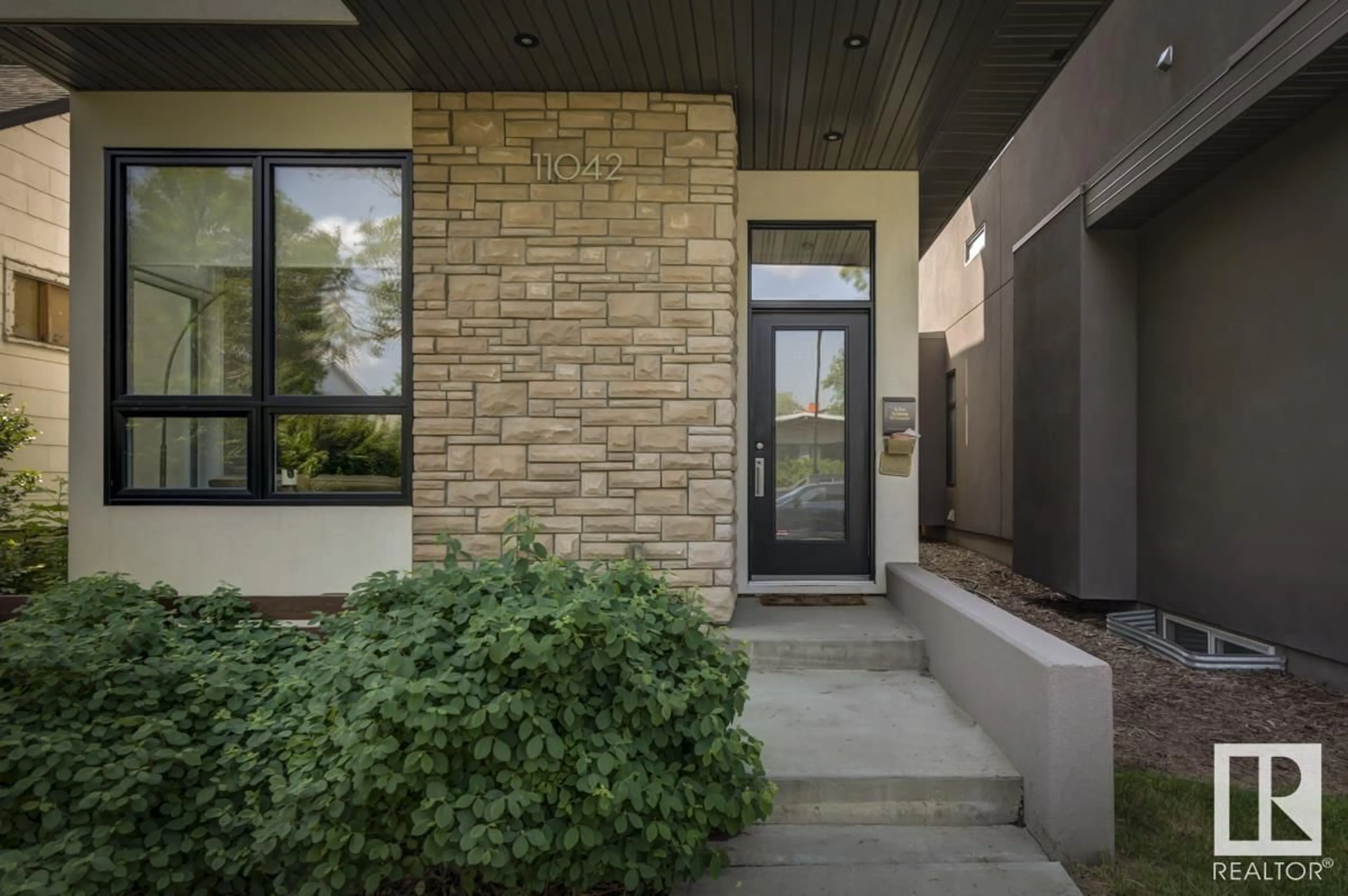 Home with brick exterior material, street for NW - 11042 131 ST, Edmonton Alberta T5M1B8