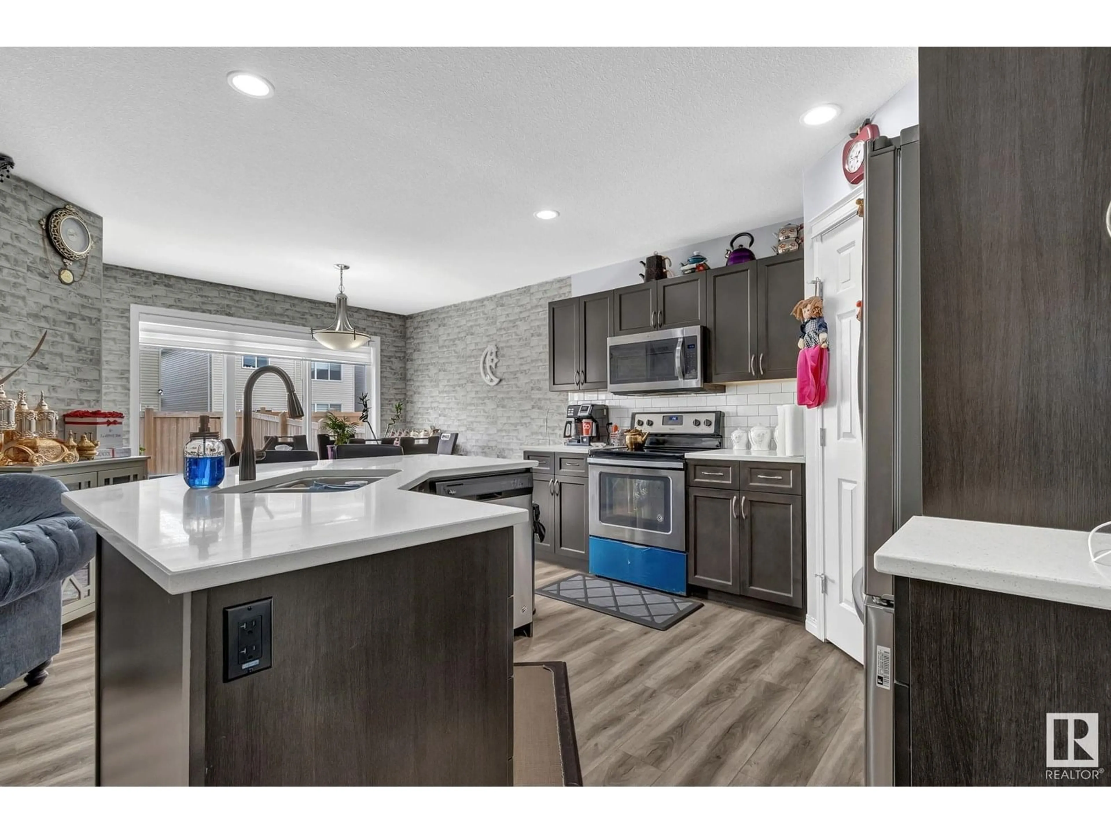Open concept kitchen, unknown for NW - 17723 64 ST, Edmonton Alberta T5Y3X3