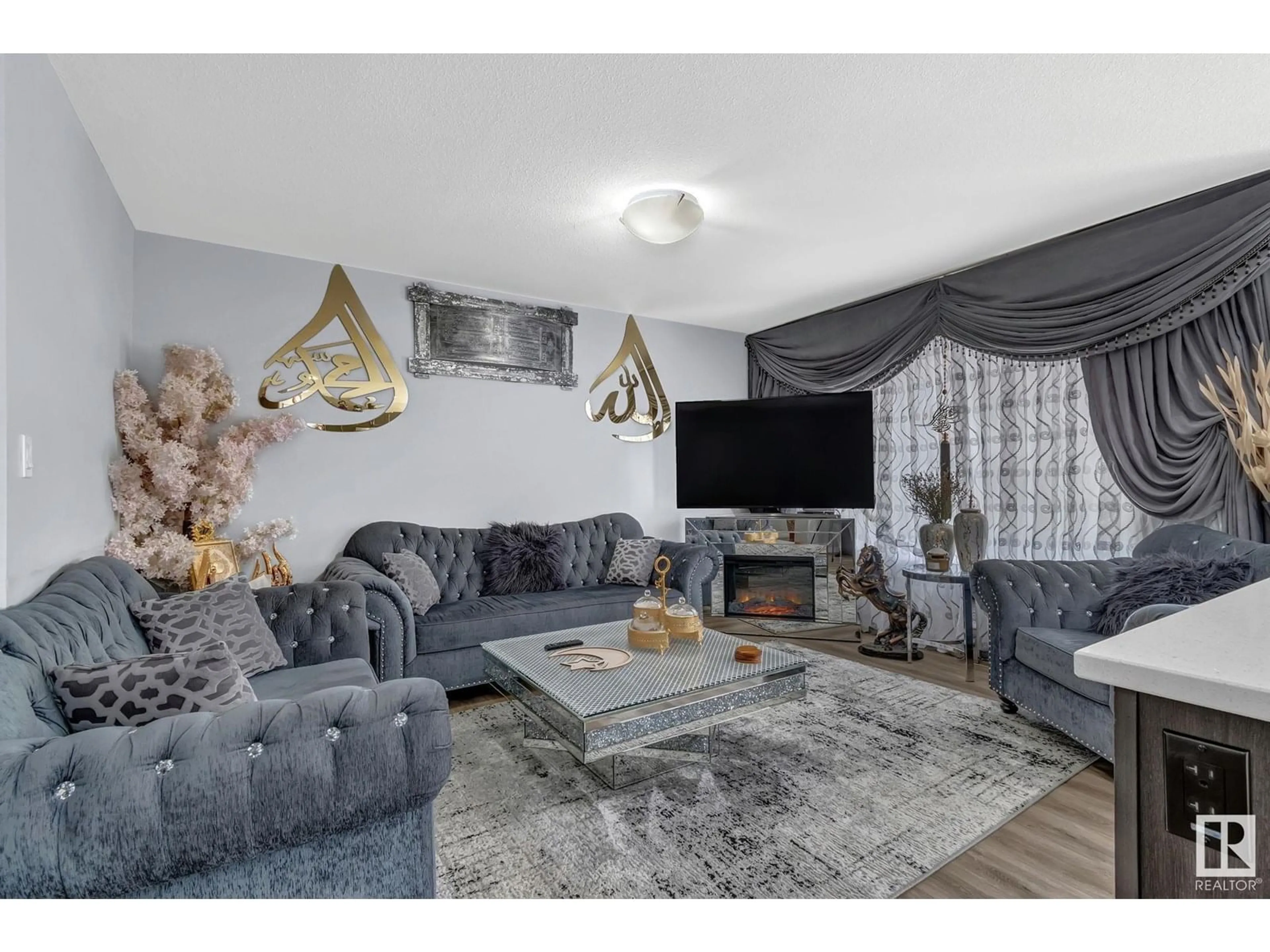 Living room with furniture, unknown for NW - 17723 64 ST, Edmonton Alberta T5Y3X3