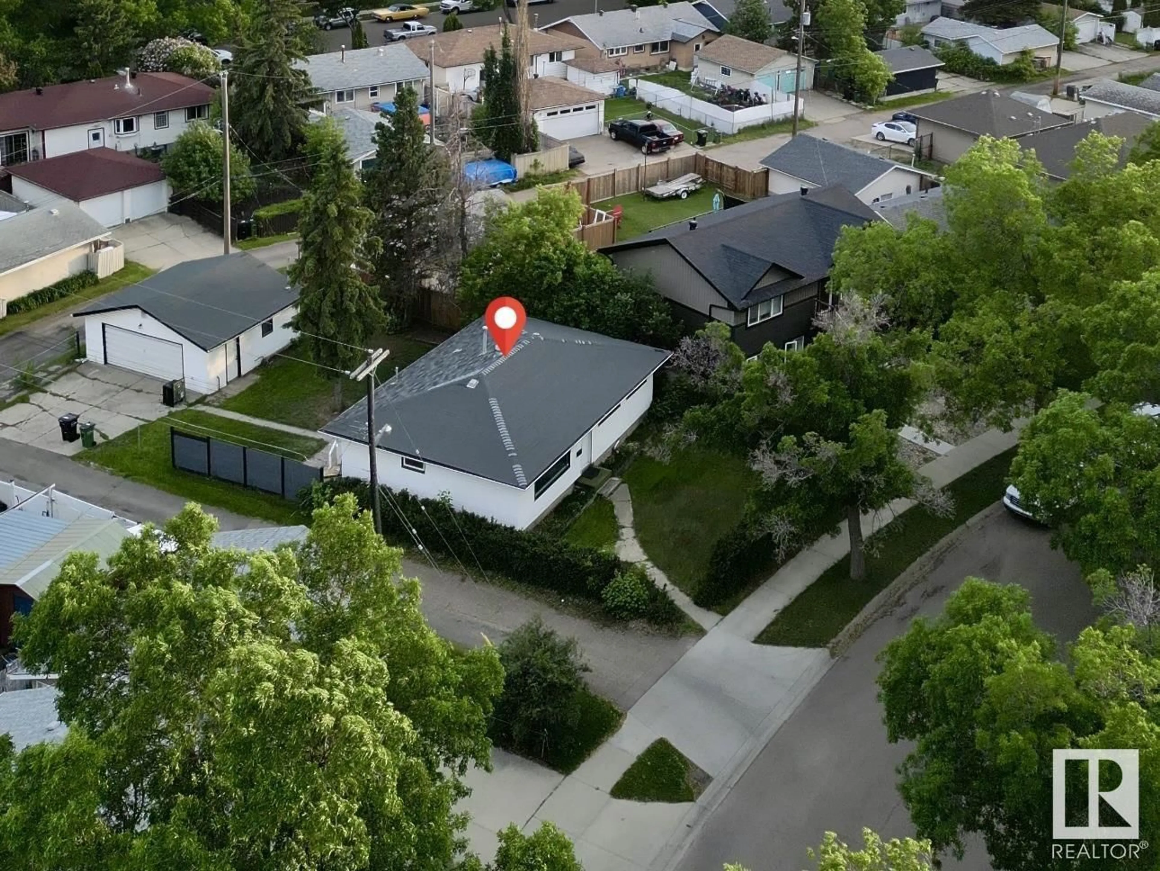 A pic from outside/outdoor area/front of a property/back of a property/a pic from drone, street for 16415 106 AV, Edmonton Alberta T5P0X1