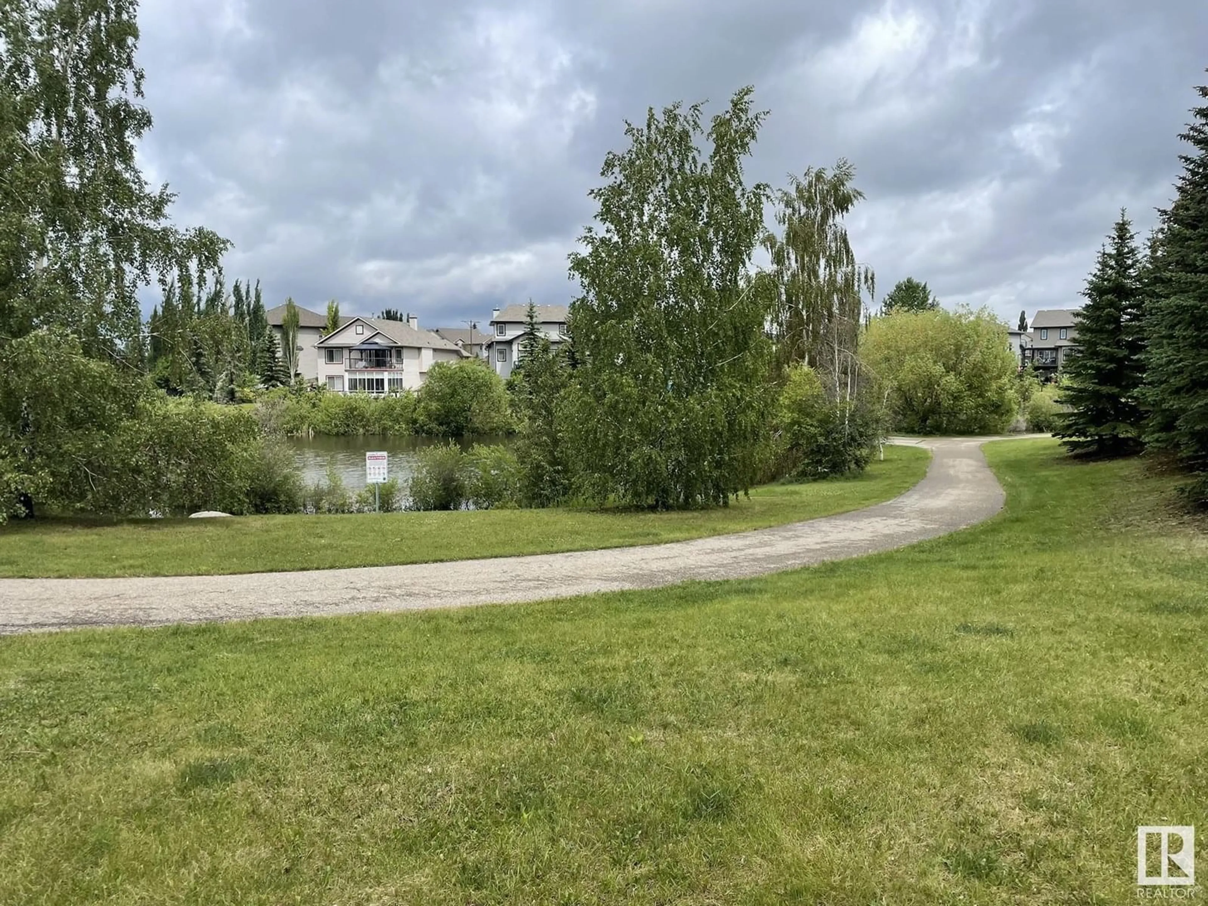 A pic from outside/outdoor area/front of a property/back of a property/a pic from drone, water/lake/river/ocean view for 207 - 7021 SOUTH TERWILLEGAR DR, Edmonton Alberta T6R0W5
