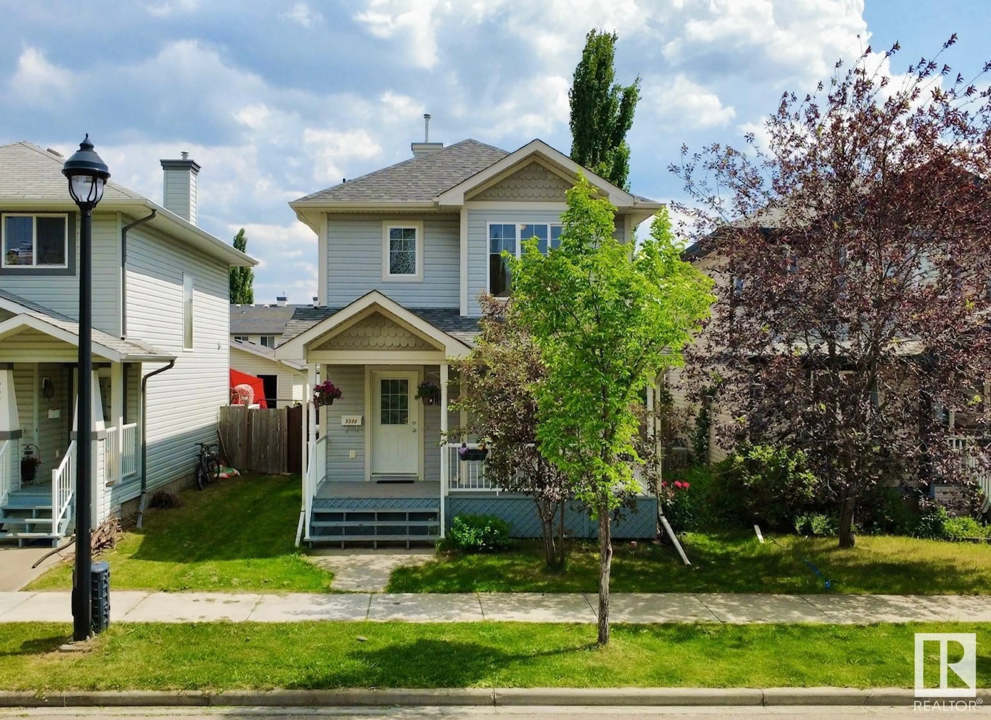 Home with vinyl exterior material, street for 5596 STEVENS CR, Edmonton Alberta T6R0A4