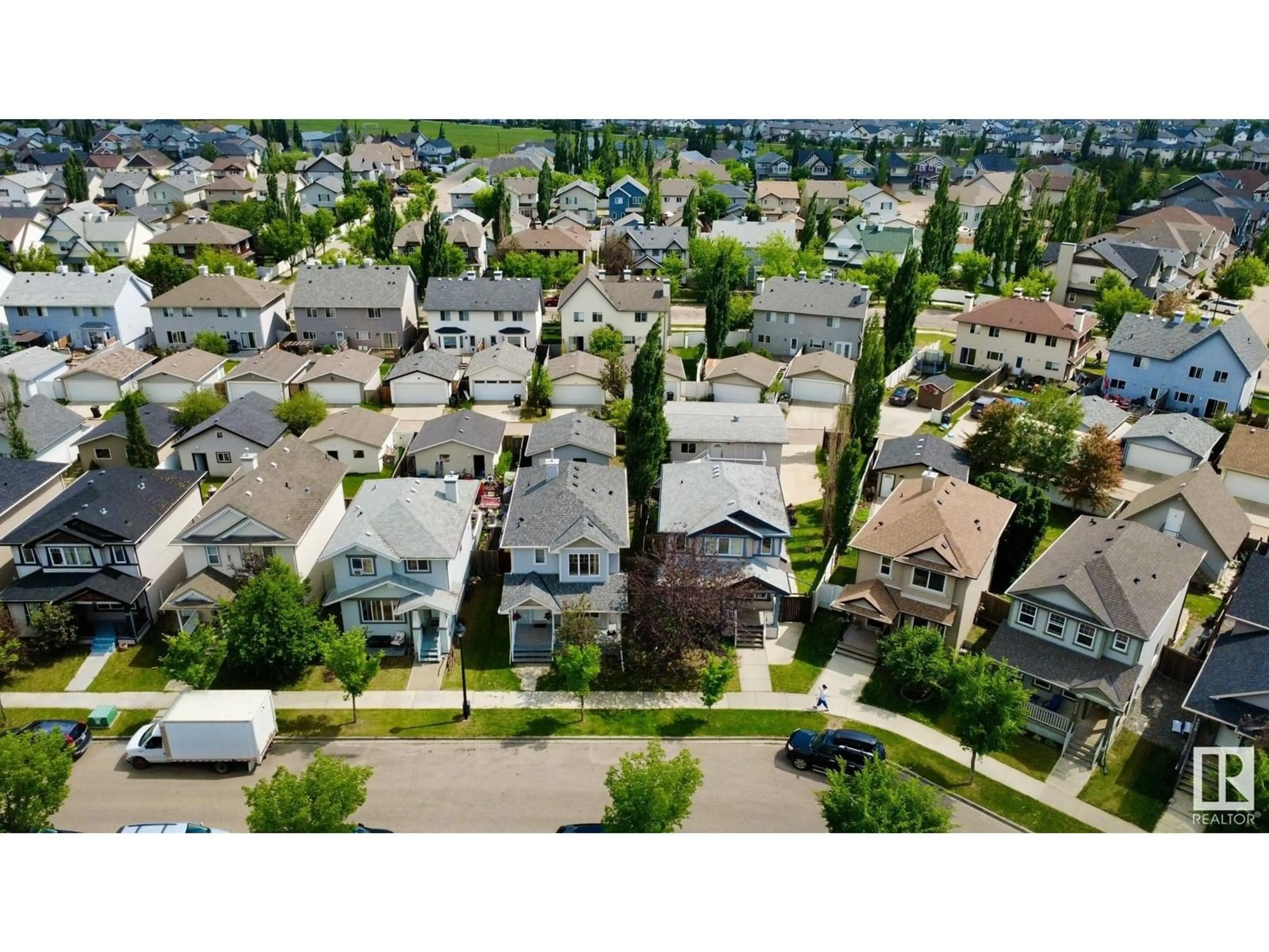 A pic from outside/outdoor area/front of a property/back of a property/a pic from drone, street for 5596 STEVENS CR, Edmonton Alberta T6R0A4