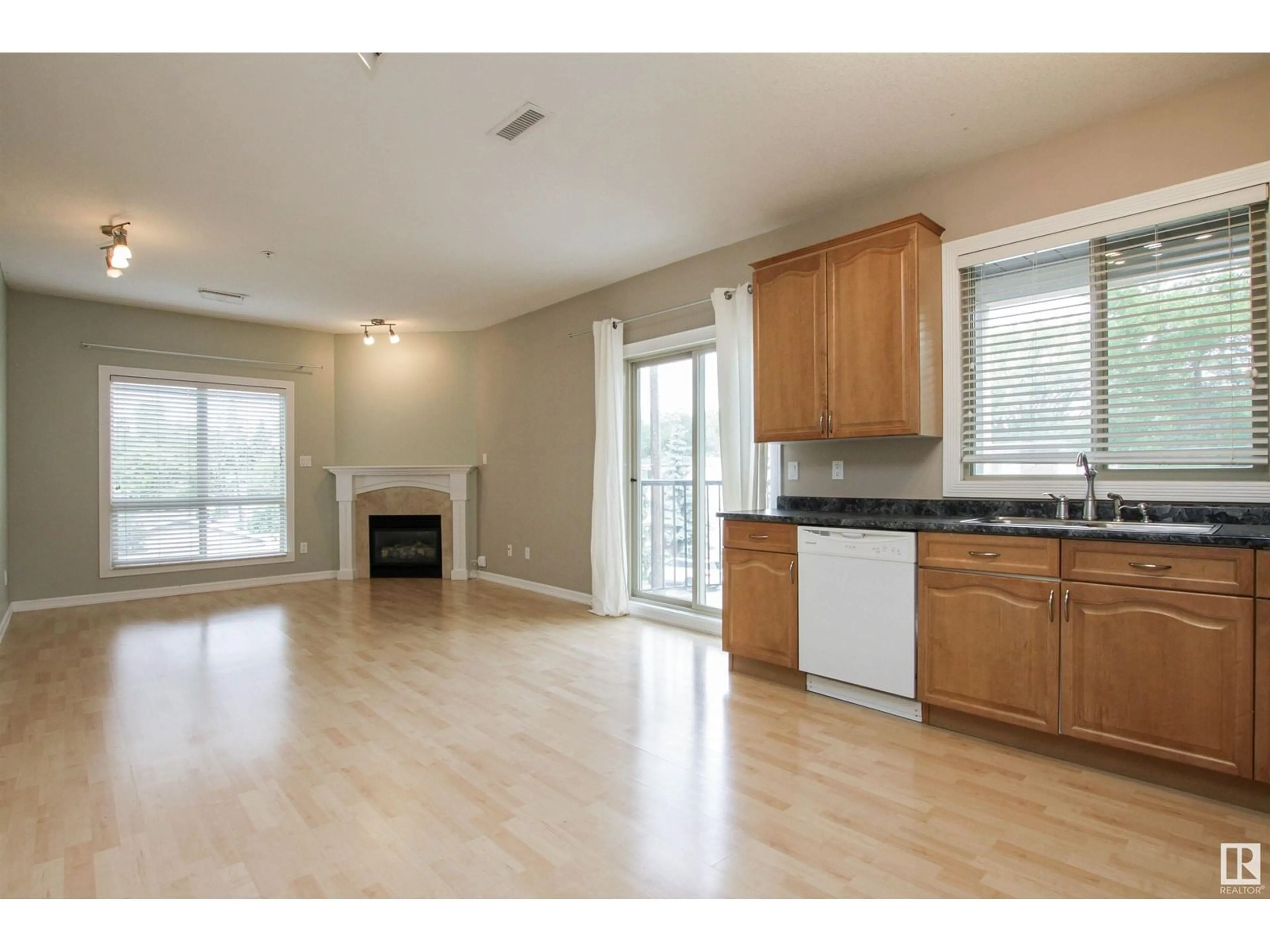 Open concept kitchen, wood/laminate floor for #203 - 10630 78 AV, Edmonton Alberta T6E1P5