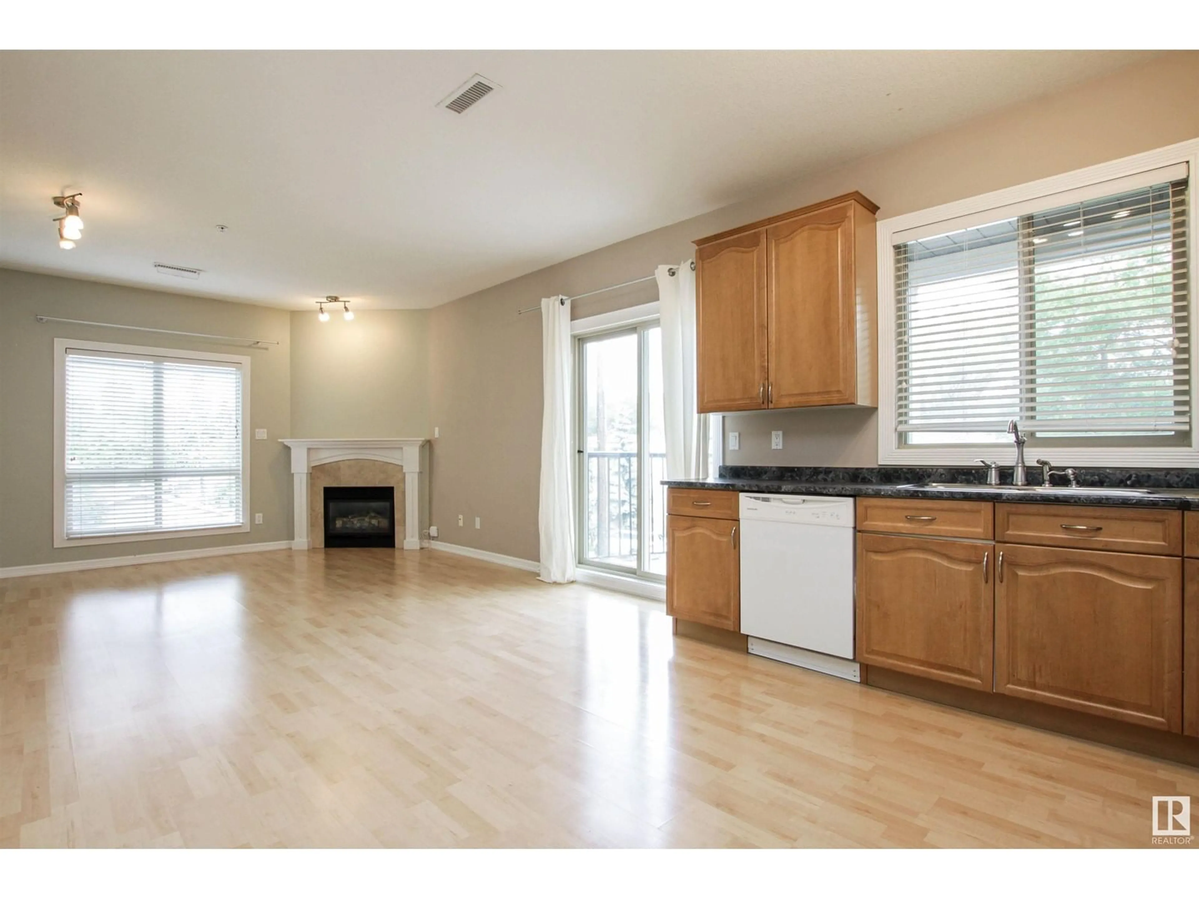 Open concept kitchen, wood/laminate floor for #203 - 10630 78 AV, Edmonton Alberta T6E1P5