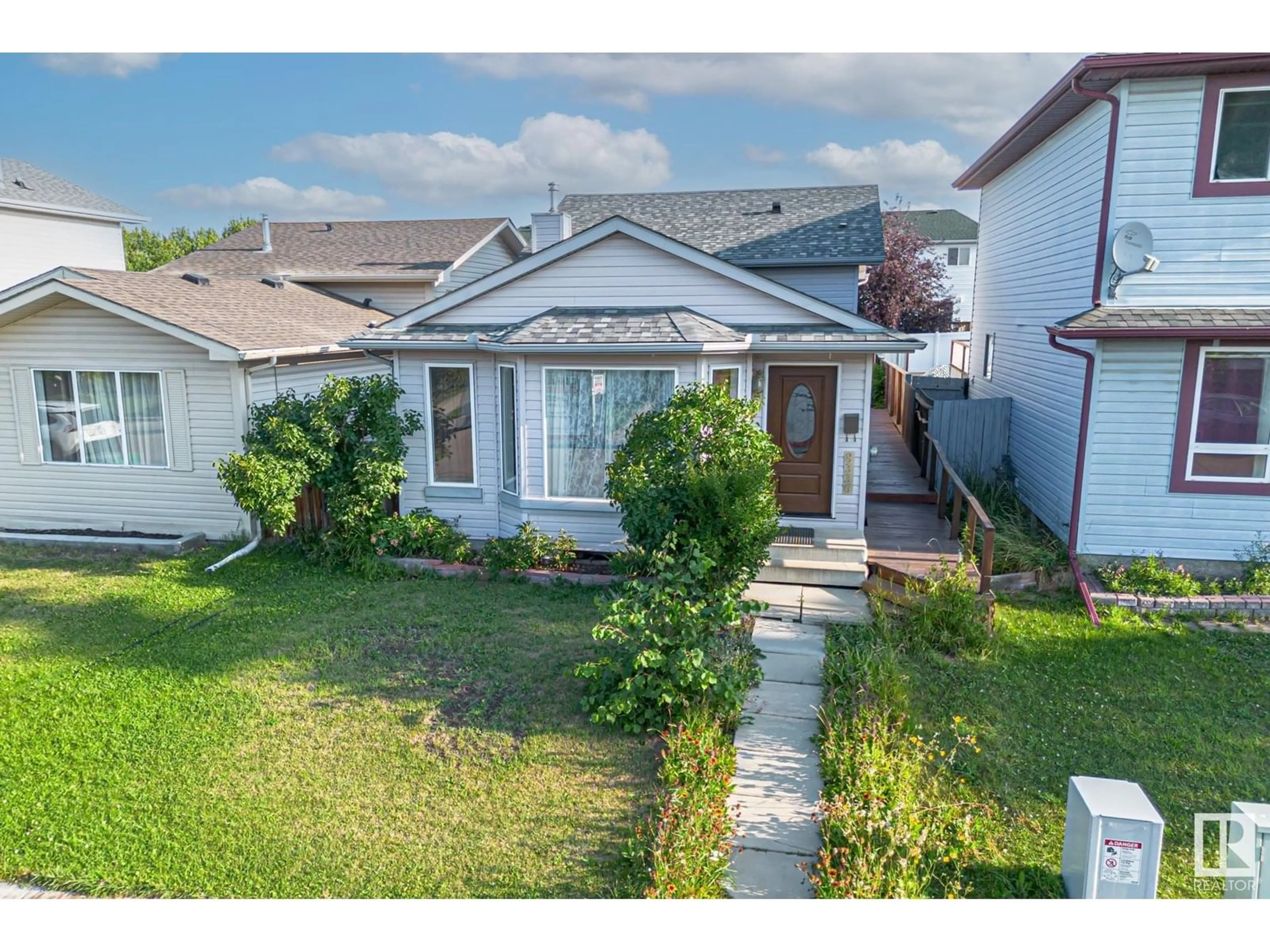 A pic from outside/outdoor area/front of a property/back of a property/a pic from drone, street for NW - 8336 159 AV, Edmonton Alberta T5Z3C8