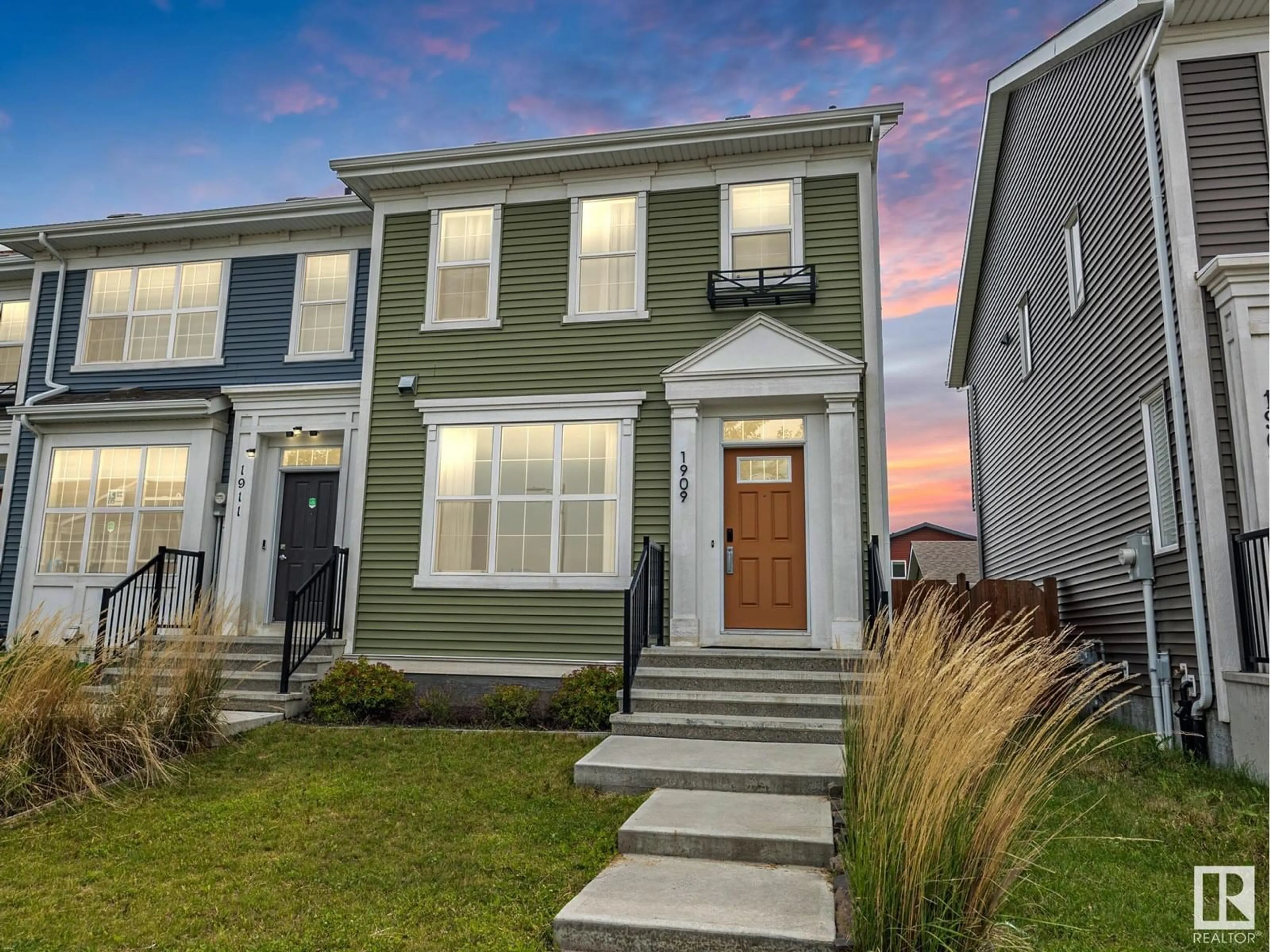 Home with vinyl exterior material, street for 1909 24 ST, Edmonton Alberta T6T2C9