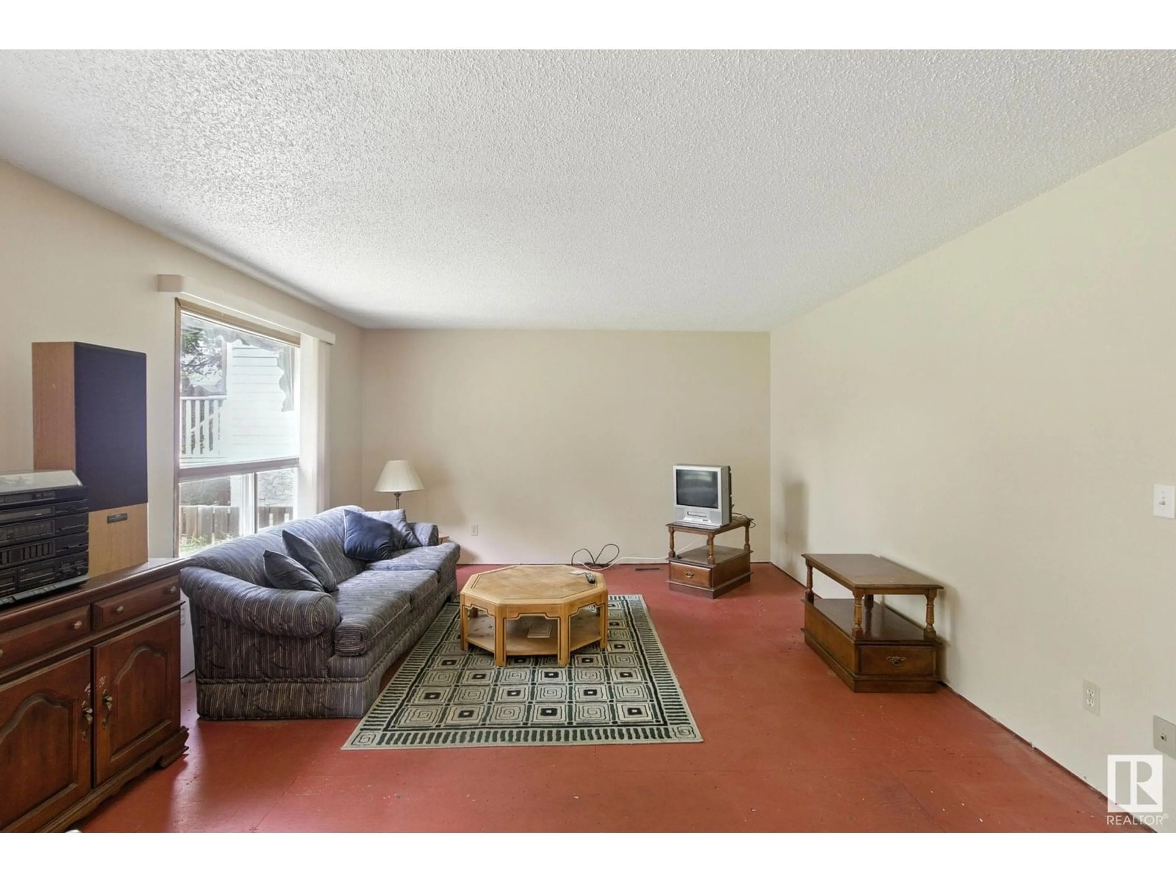 Living room with furniture, unknown for NW - 11313 87 ST, Edmonton Alberta T5V3L8