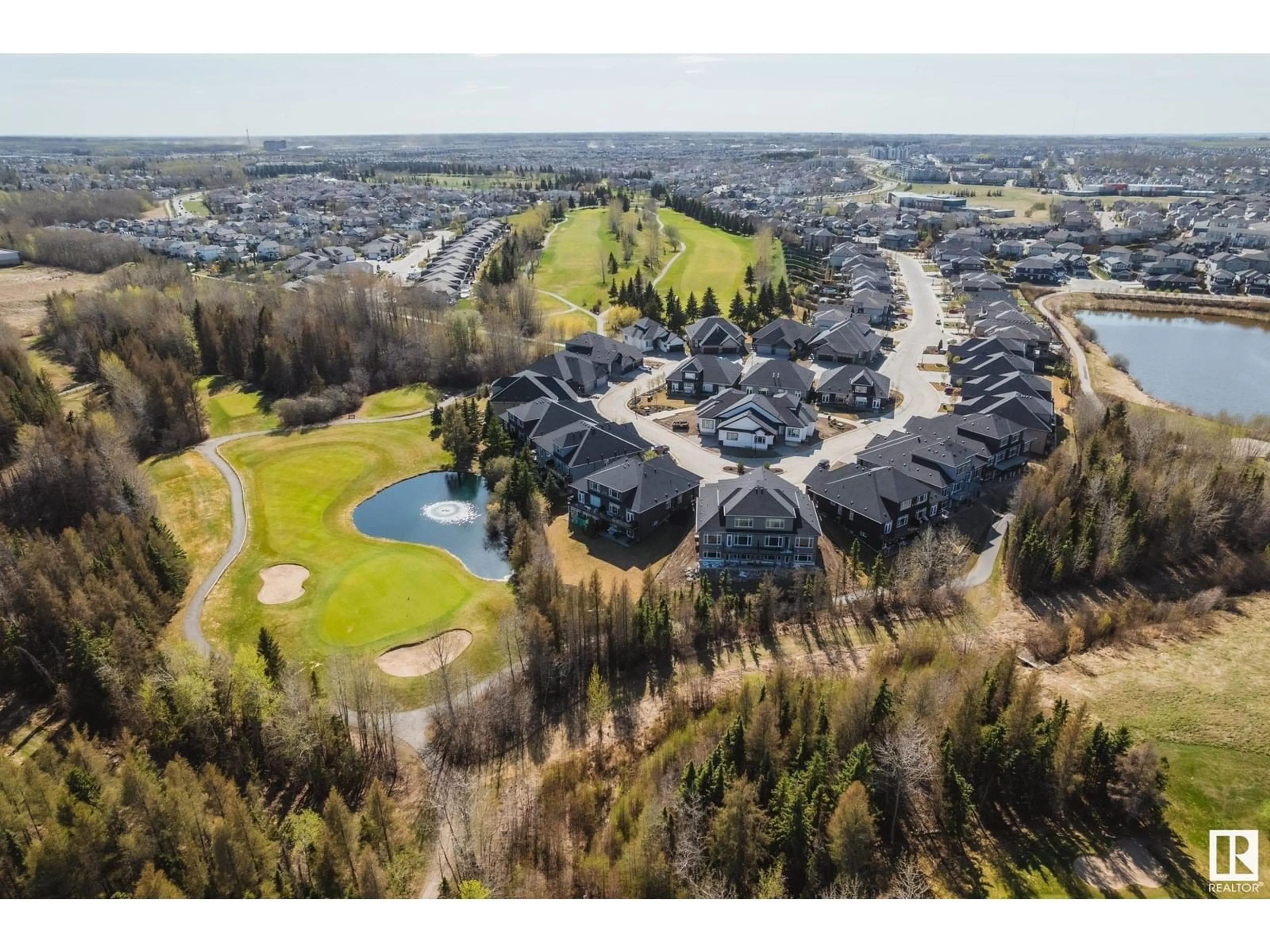 A pic from outside/outdoor area/front of a property/back of a property/a pic from drone, unknown for 21 - 20425 93 AV NW, Edmonton Alberta T5T7C7