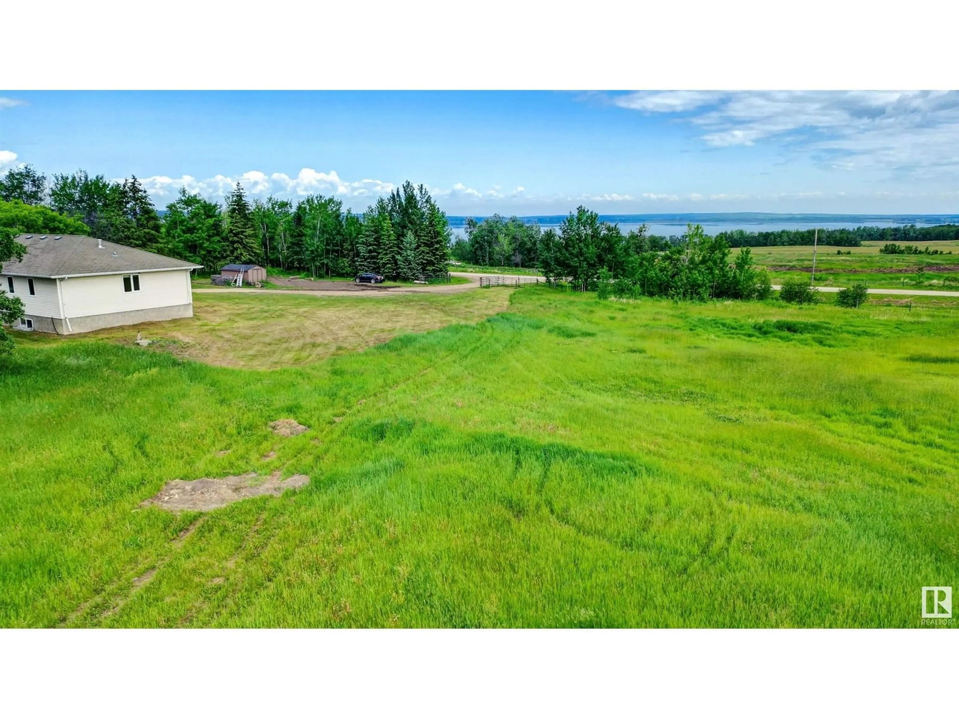 A pic from outside/outdoor area/front of a property/back of a property/a pic from drone, water/lake/river/ocean view for 43021 TWP RD 602, Rural Bonnyville M.D. Alberta T9N2J3