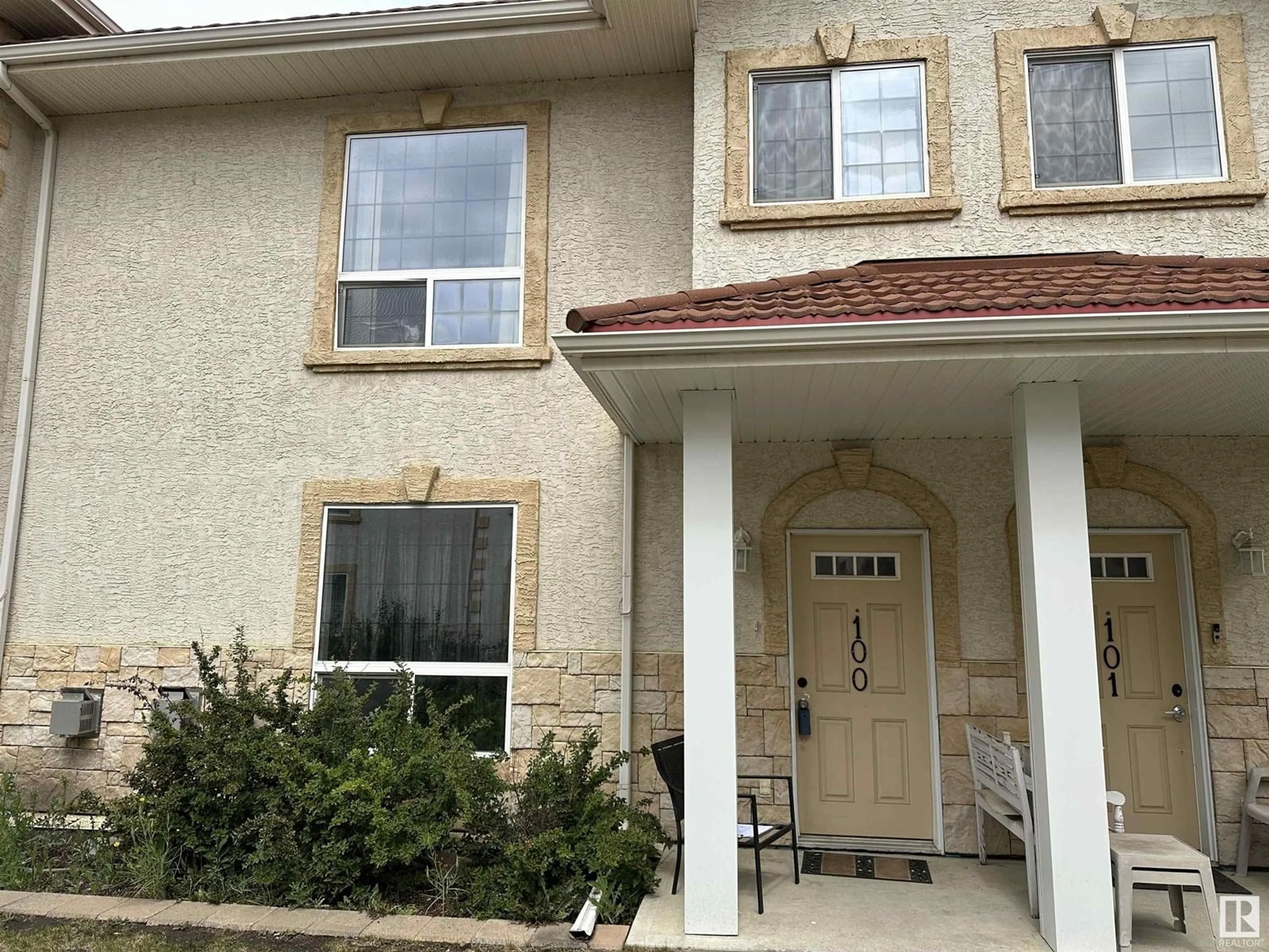 Home with vinyl exterior material, street for #100 - 13825 155 AV, Edmonton Alberta T6V0B8
