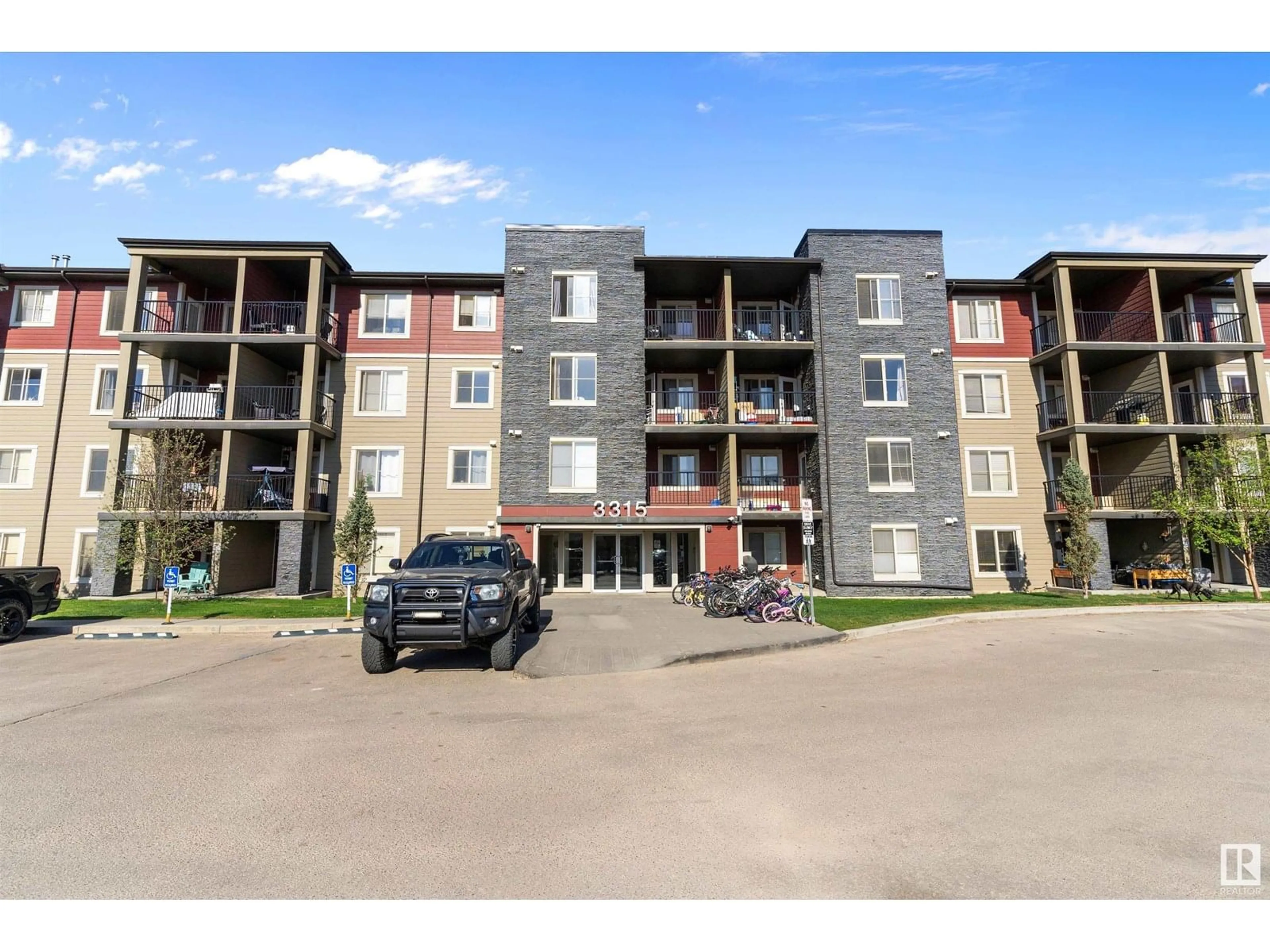 A pic from outside/outdoor area/front of a property/back of a property/a pic from drone, building for #221 - 3315 JAMES MOWATT TR, Edmonton Alberta T6W3L6