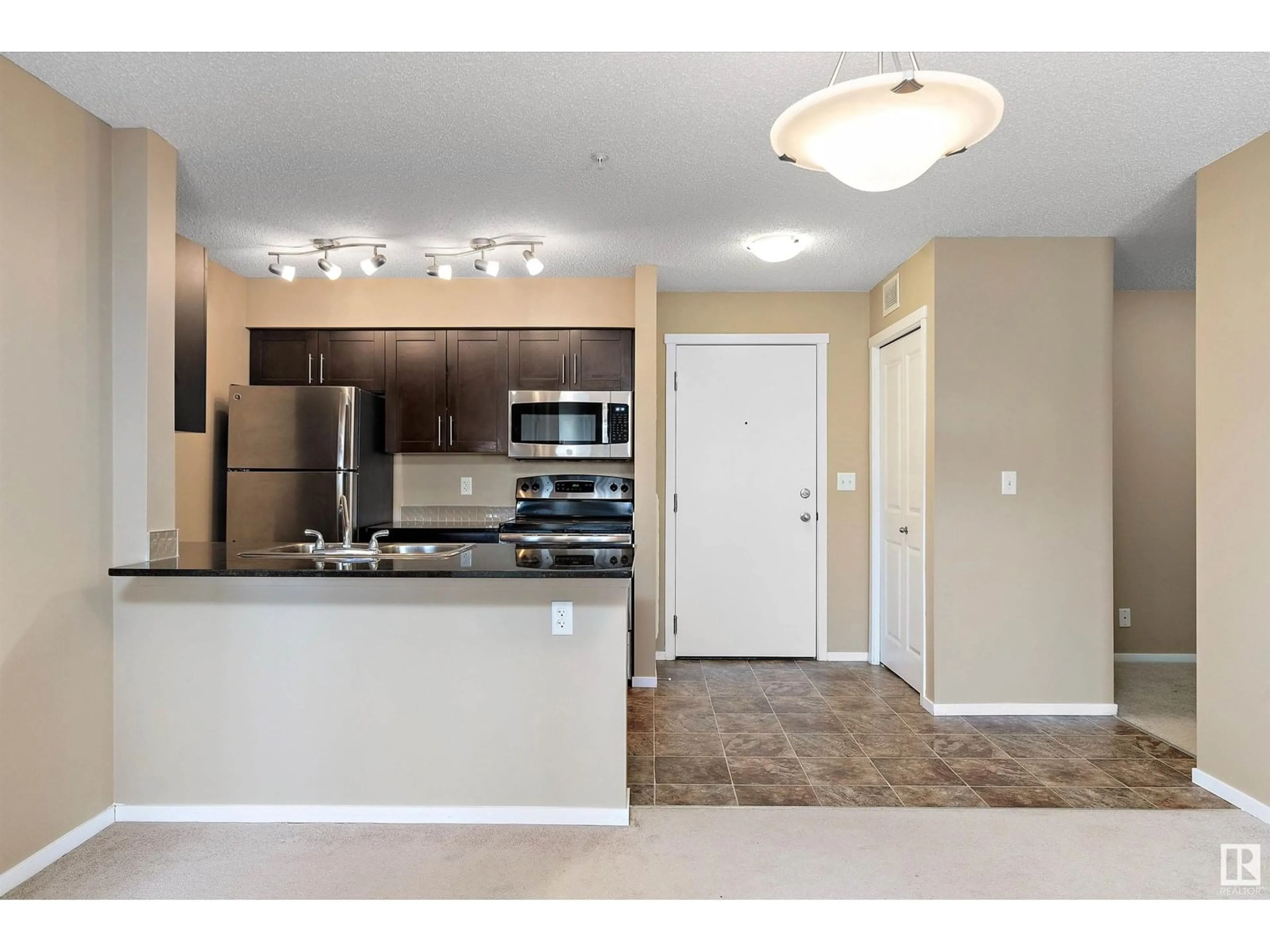 Standard kitchen, unknown for #221 - 3315 JAMES MOWATT TR, Edmonton Alberta T6W3L6