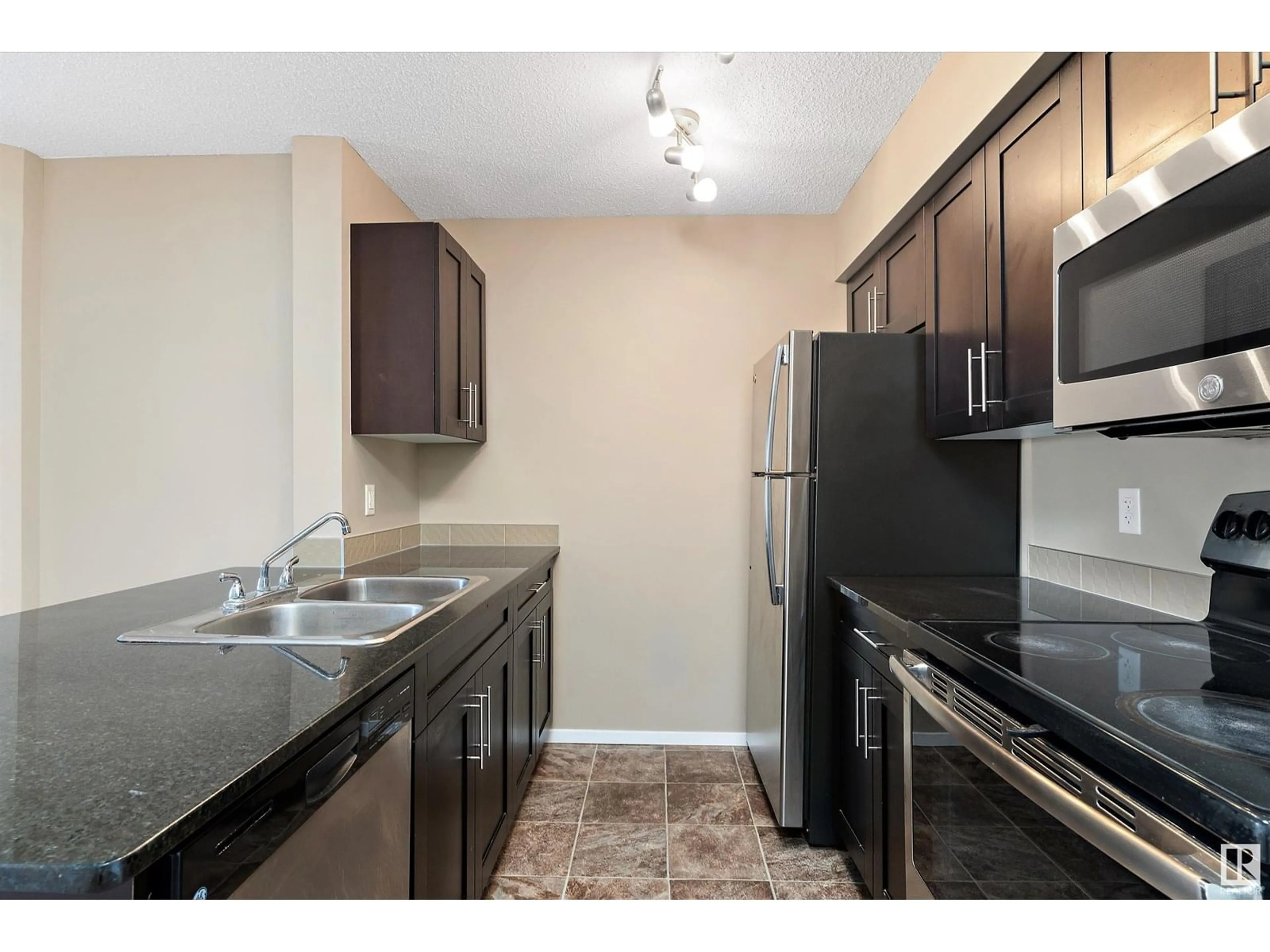 Standard kitchen, unknown for #221 - 3315 JAMES MOWATT TR, Edmonton Alberta T6W3L6
