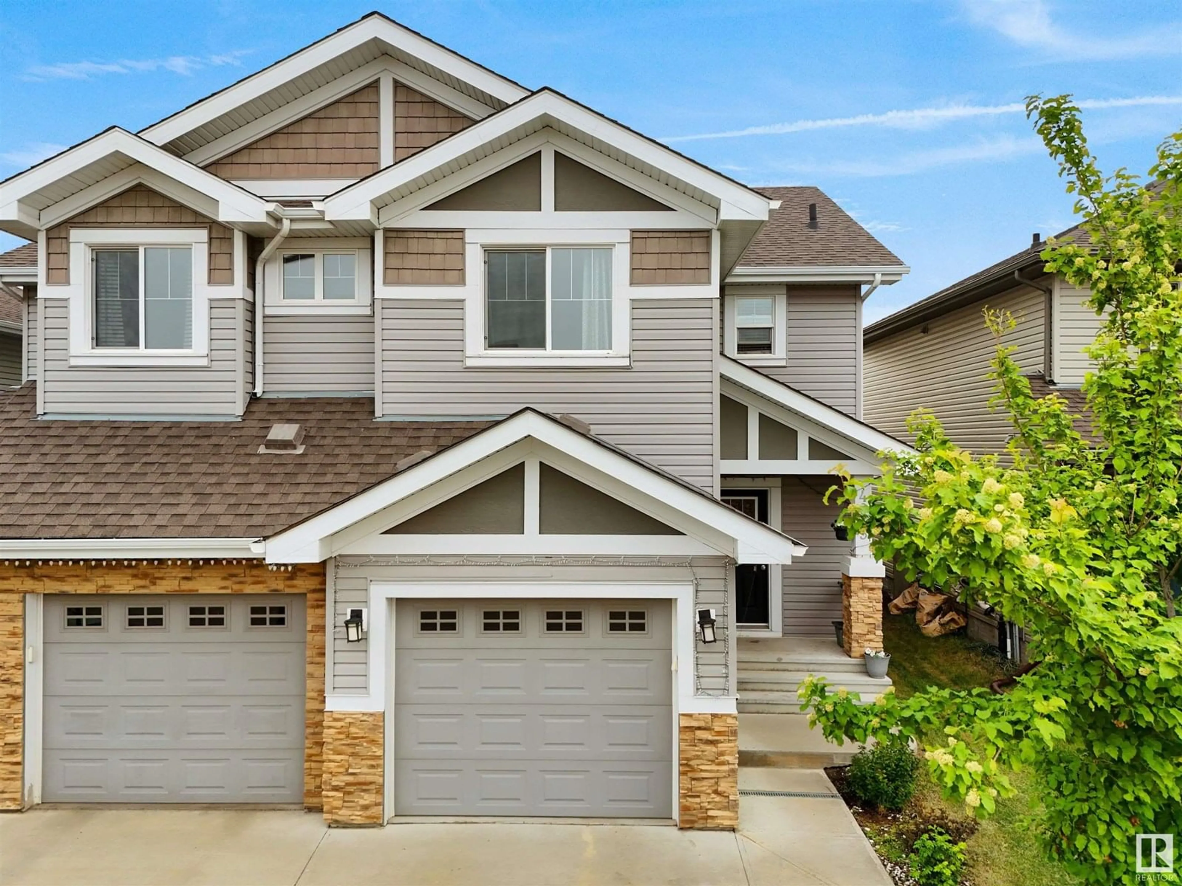 Home with vinyl exterior material, street for 4015 6 ST, Edmonton Alberta T6T0T5