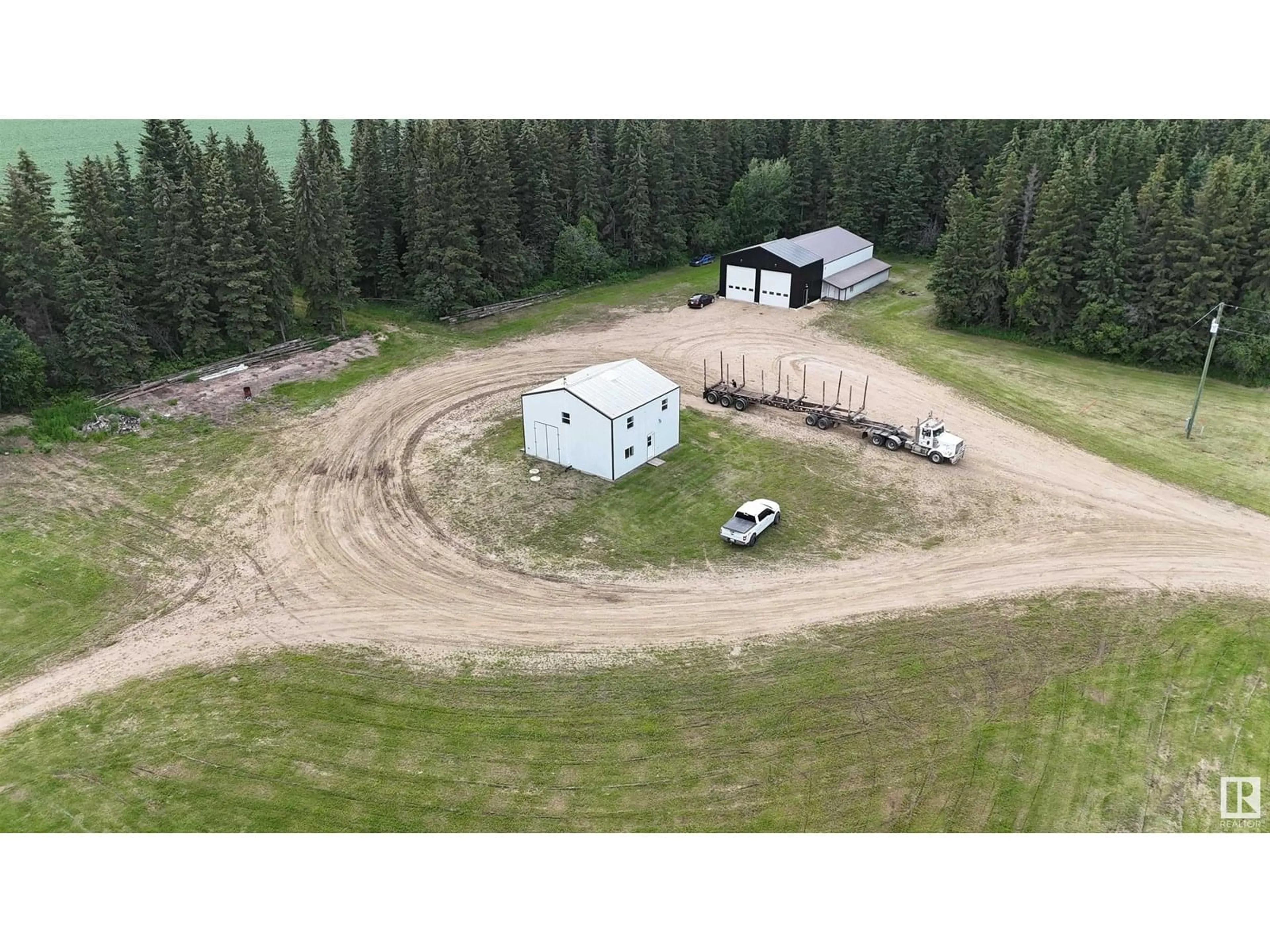 A pic from outside/outdoor area/front of a property/back of a property/a pic from drone, building for SW;5;70 - 20 WEST OF, Calling Lake Alberta T9S0A8