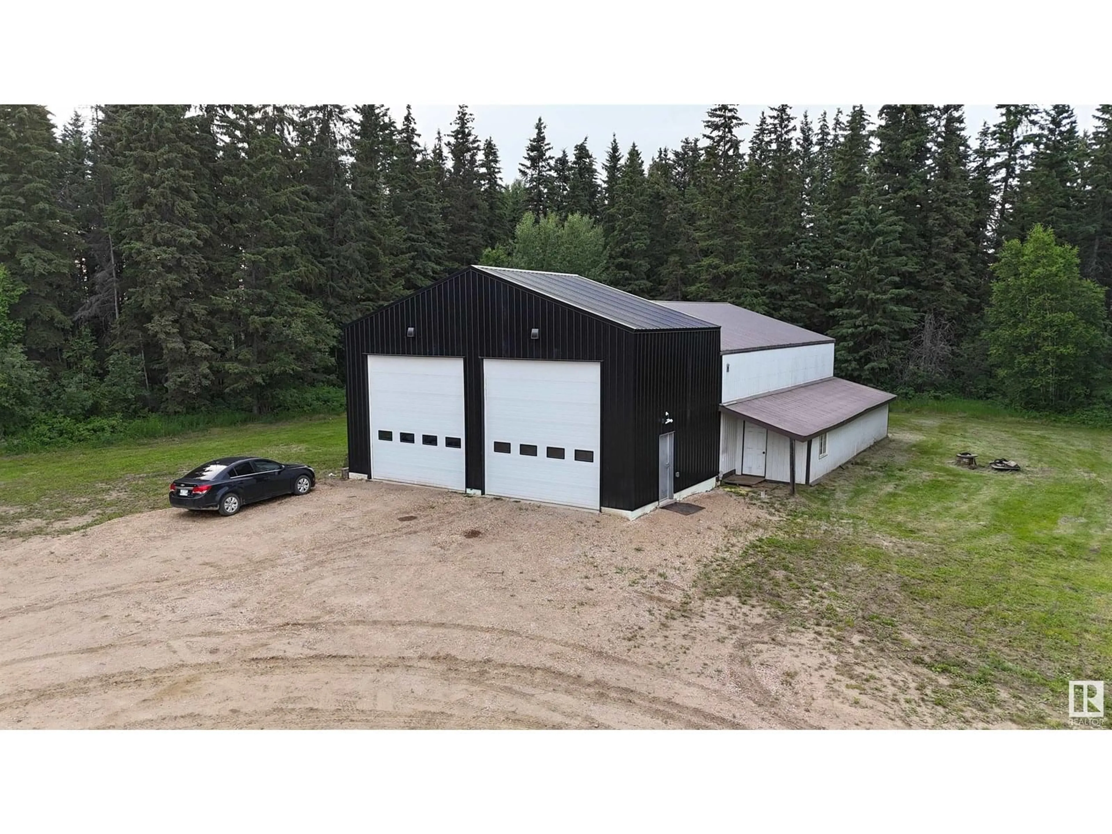 A pic from outside/outdoor area/front of a property/back of a property/a pic from drone, building for SW;5;70 - 20 WEST OF, Calling Lake Alberta T9S0A8