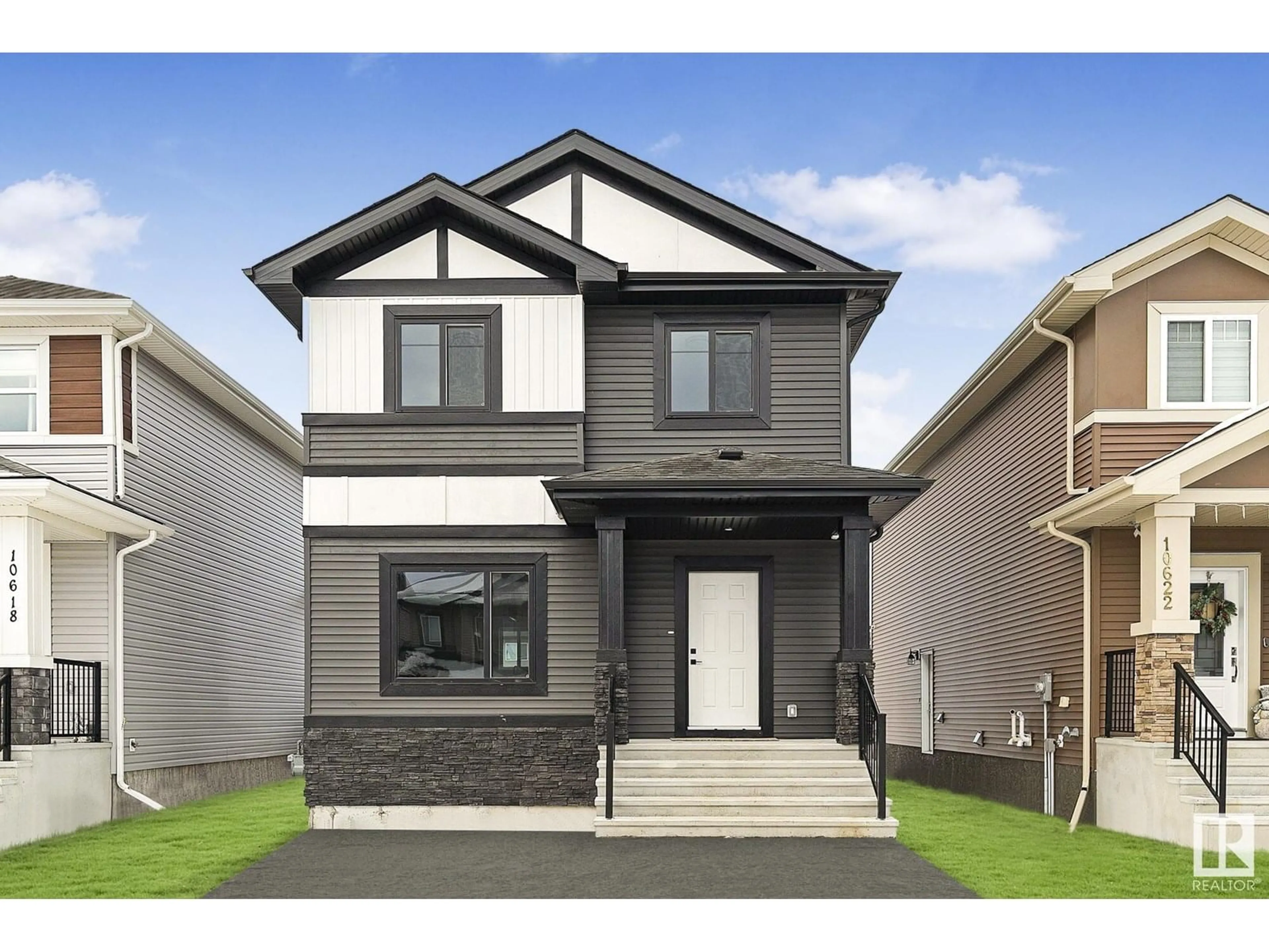 Home with vinyl exterior material, street for 9829 107A AV, Morinville Alberta T8R2P2