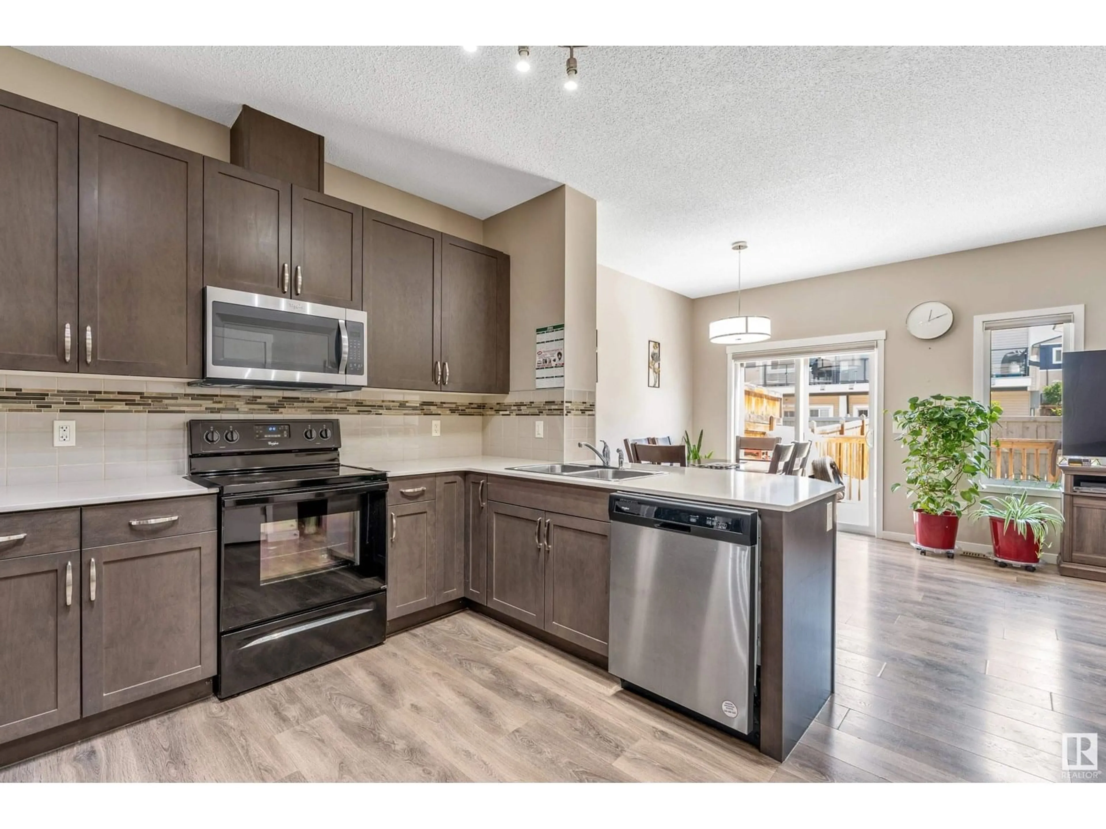 Open concept kitchen, unknown for NW - 1307 29 ST, Edmonton Alberta T6T0G7