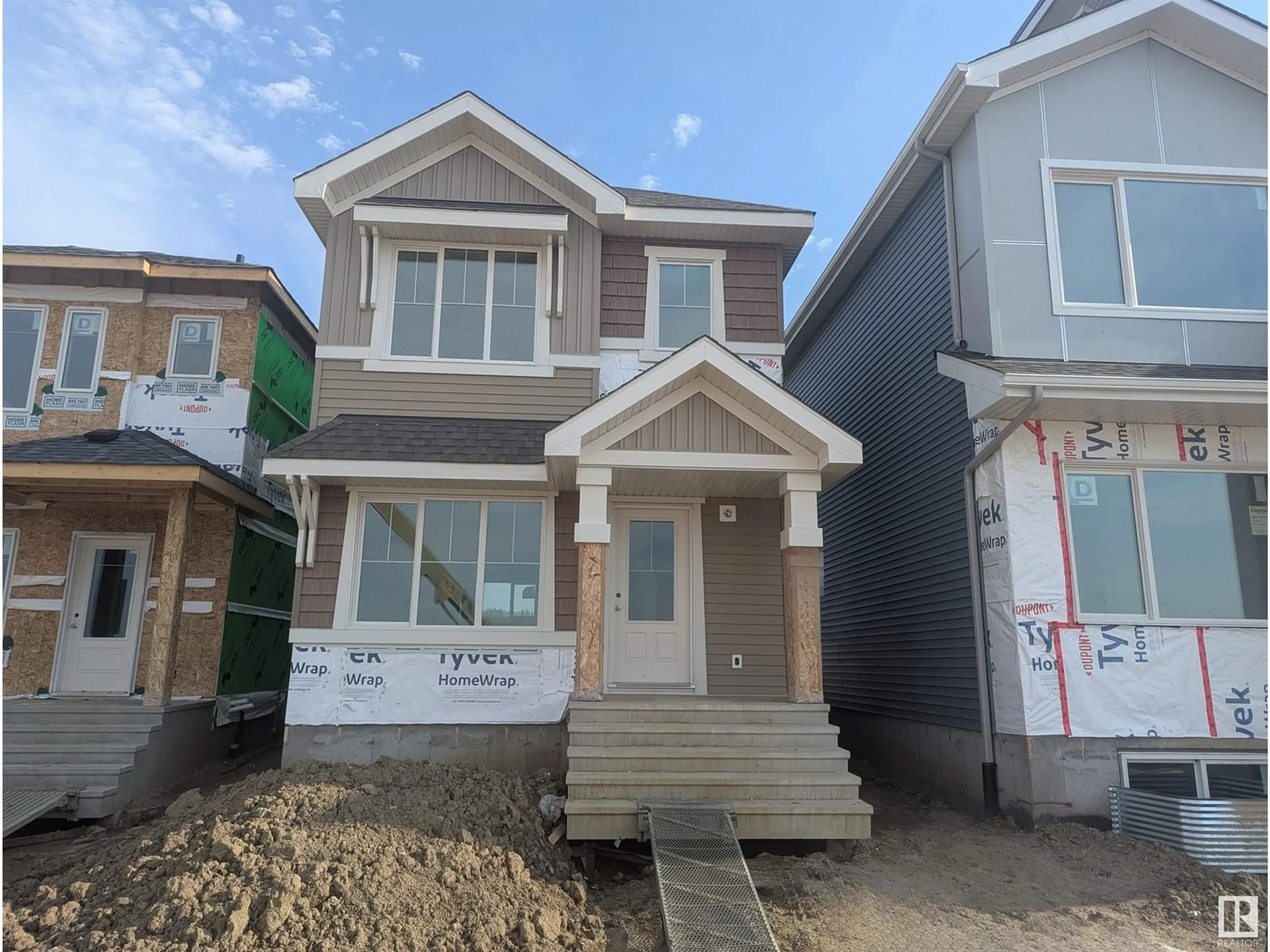 Home with vinyl exterior material, street for 4586 WARBLER LO, Edmonton Alberta T5S2C2