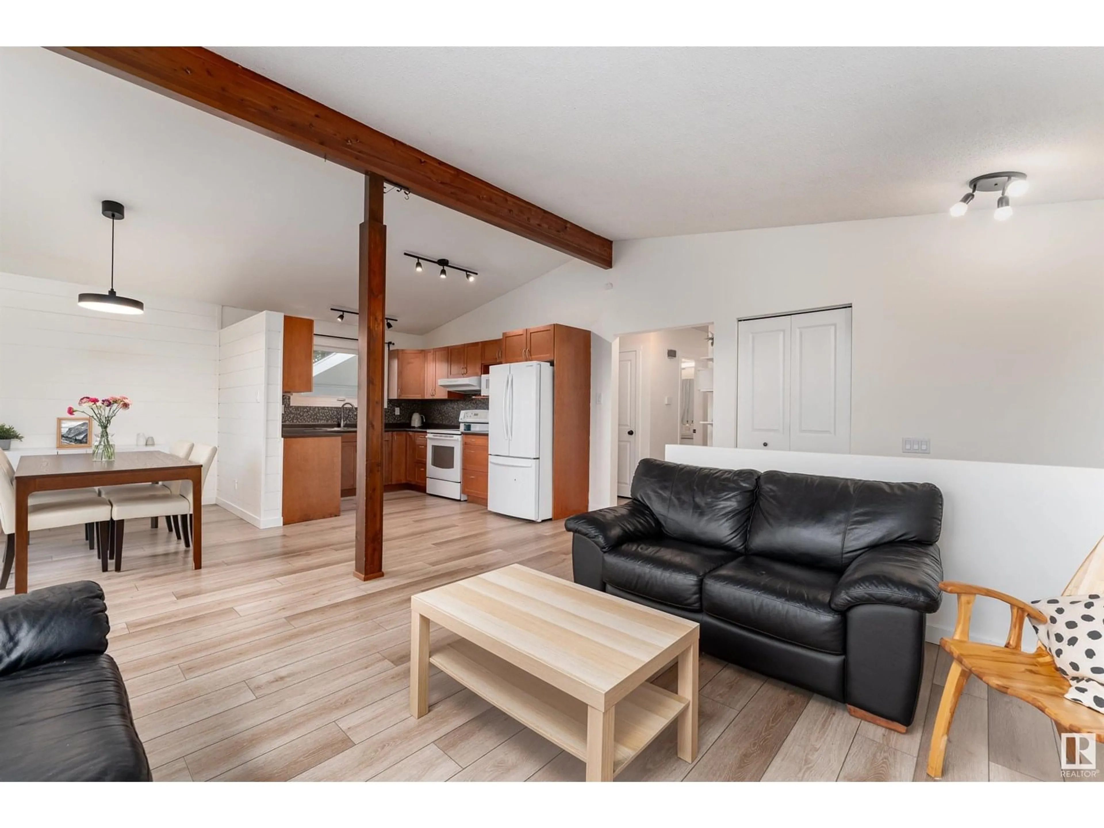 Living room with furniture, wood/laminate floor for 5117 44 AV, Leduc Alberta T9E5B7