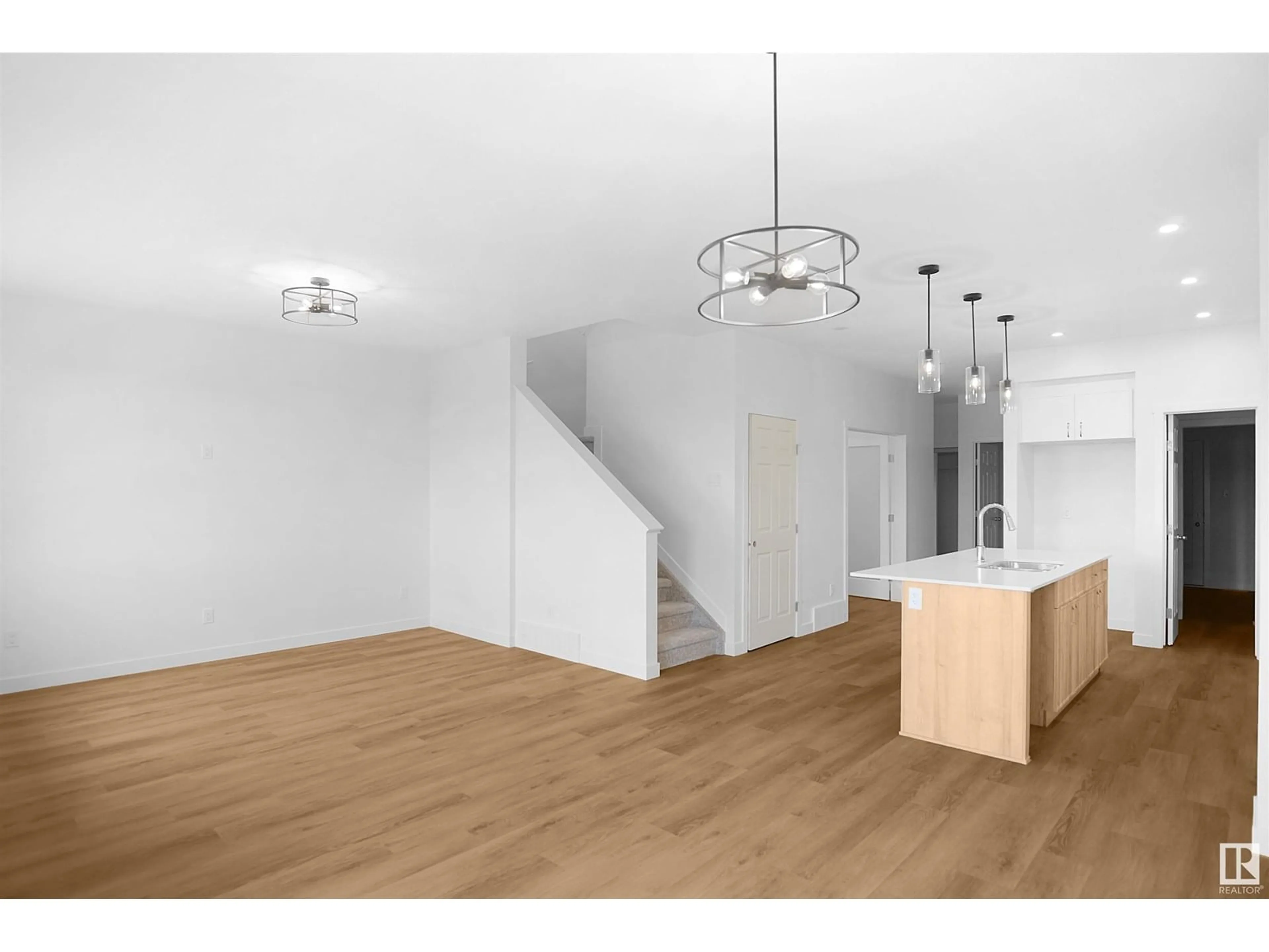 Open concept kitchen, wood/laminate floor for NW - 2544 211 ST, Edmonton Alberta T6M1P8