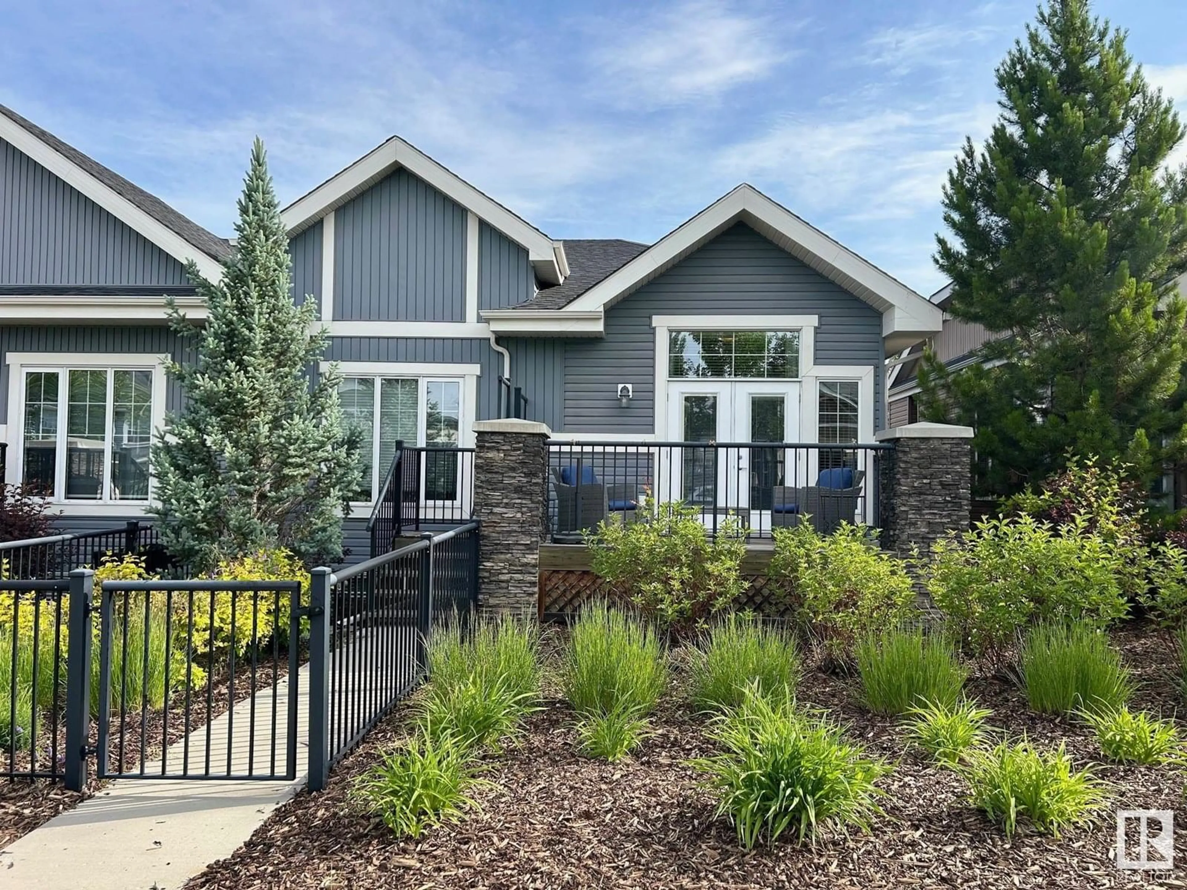 Home with vinyl exterior material, street for 15 - 4001 ETON BV, Sherwood Park Alberta T8H0N8