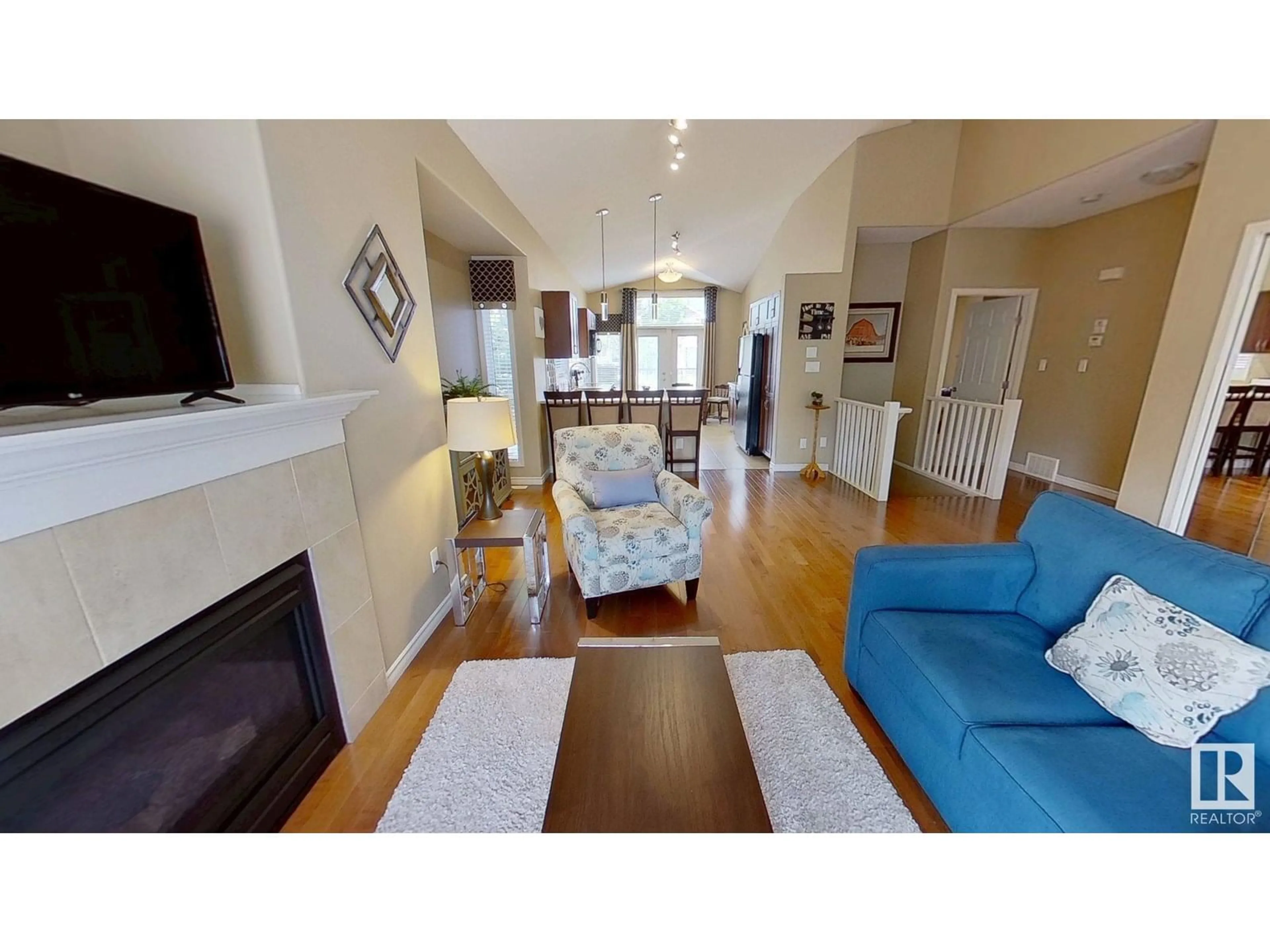 Living room with furniture, wood/laminate floor for 15 - 4001 ETON BV, Sherwood Park Alberta T8H0N8