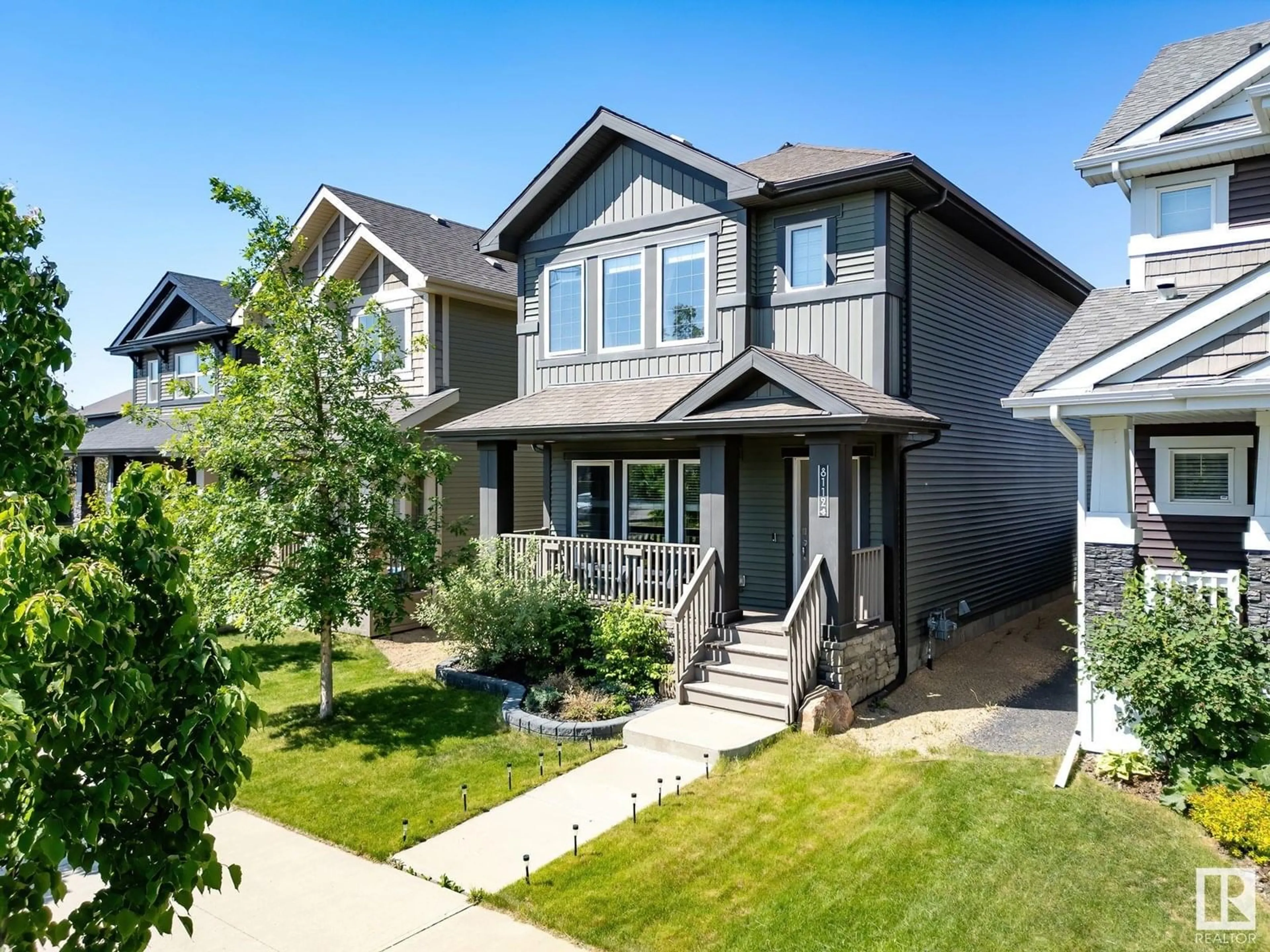 Home with vinyl exterior material, street for 8112 224 ST, Edmonton Alberta T5T7A4